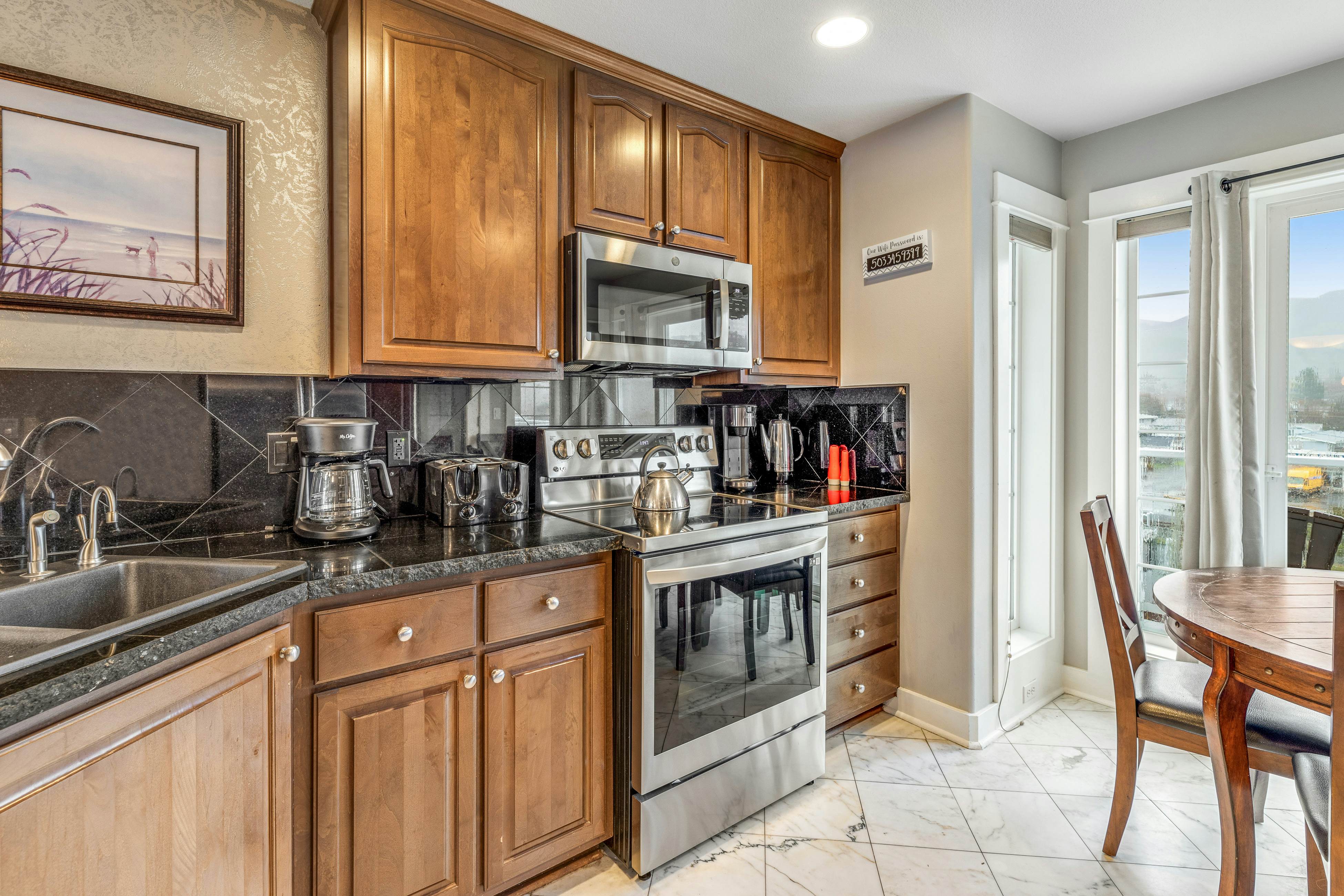 Oceanfront townhome with amazing views, decks, beach access, & updated kitchen