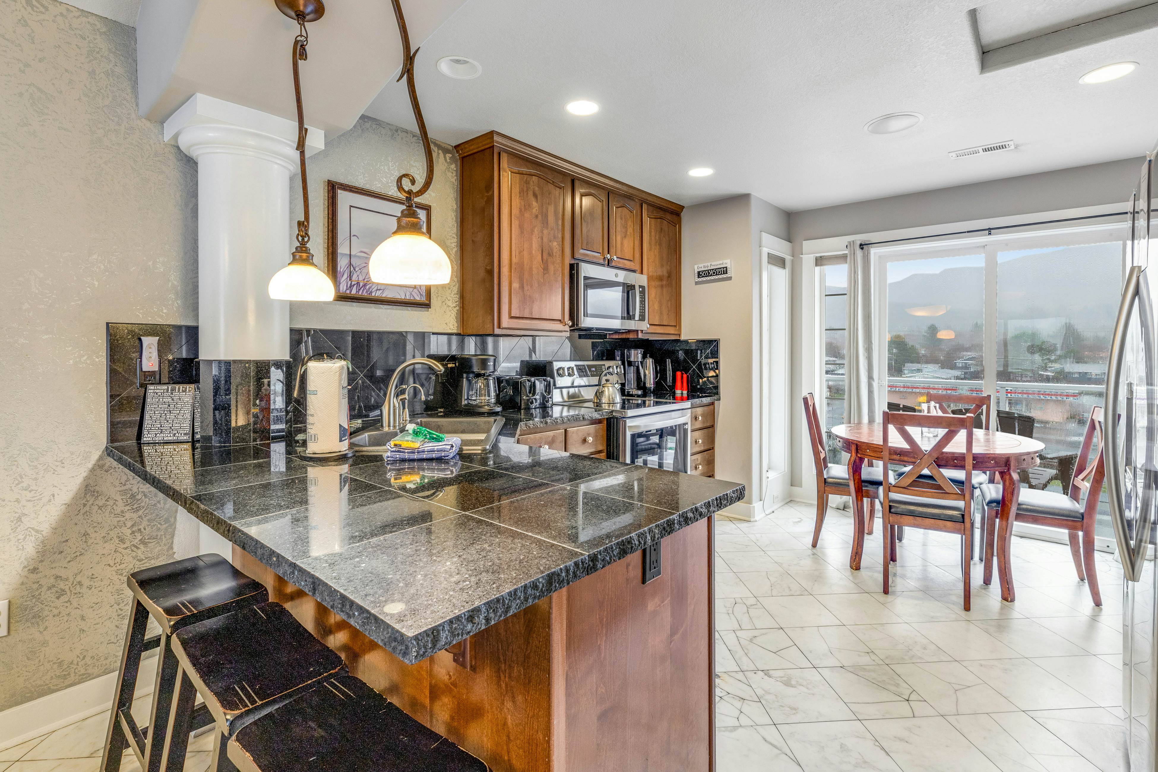 Oceanfront townhome with amazing views, decks, beach access, & updated kitchen