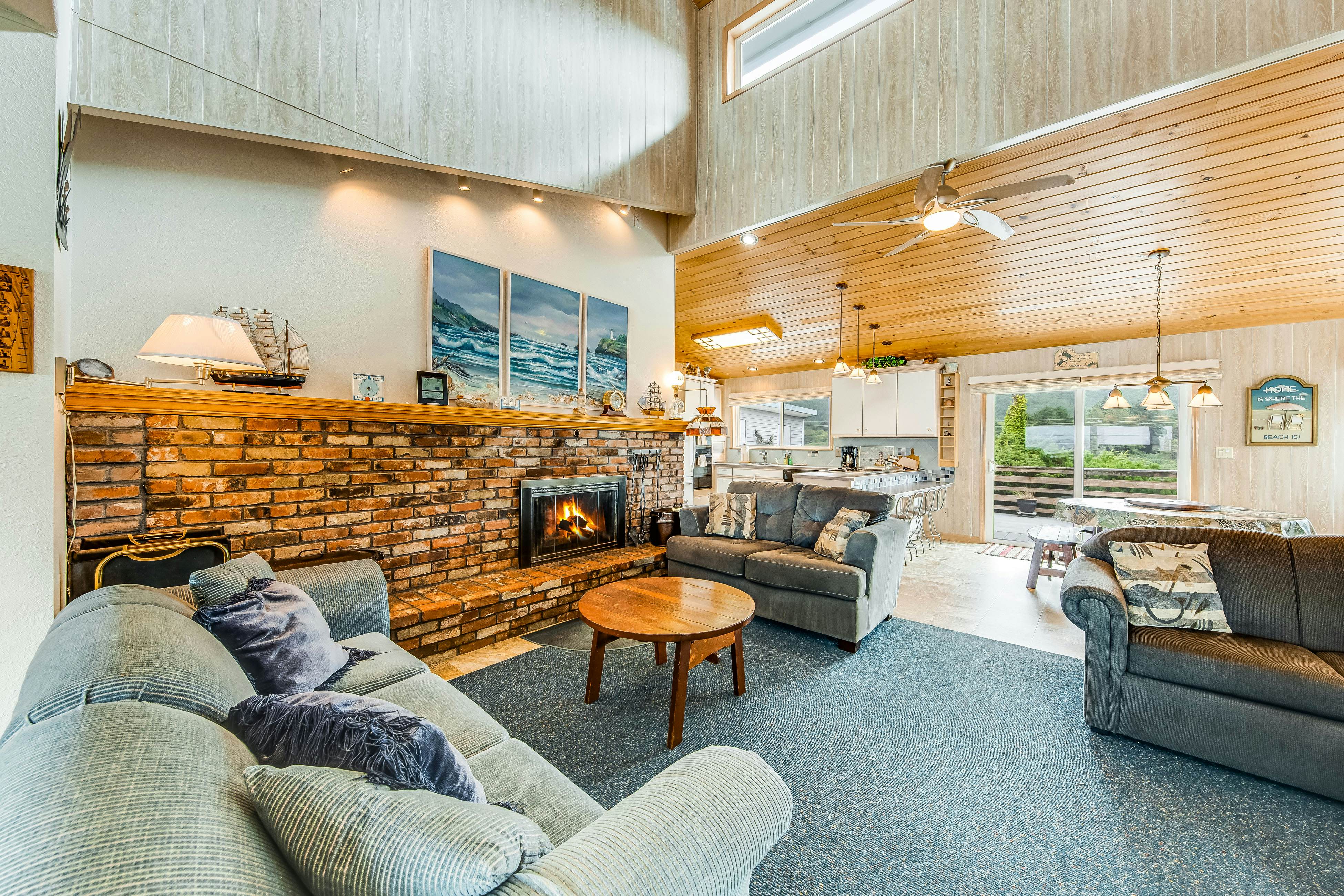 Spacious family home with ocean view balcony deck and fireplace dogs OK