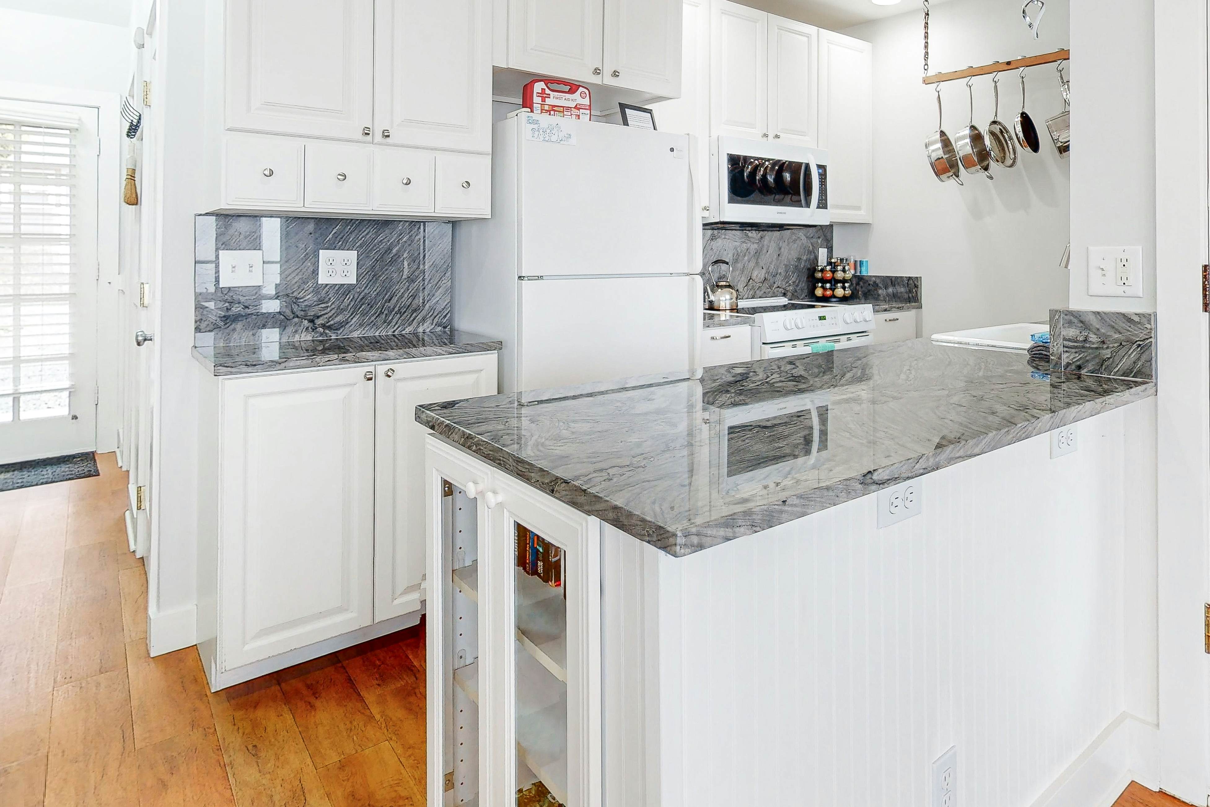 Dog-friendly condo with ocean views, private balcony & great location