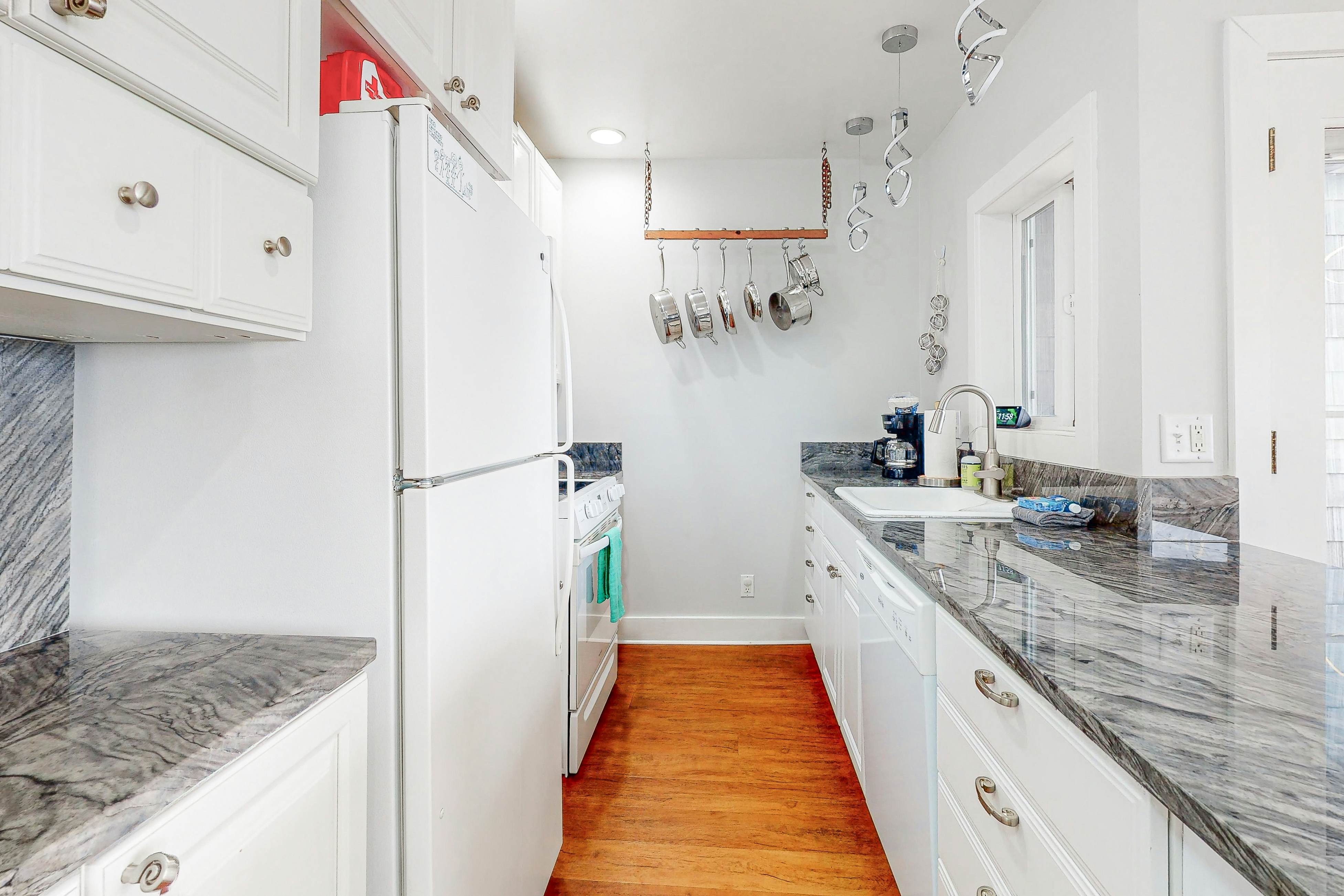 Dog-friendly condo with ocean views, private balcony & great location