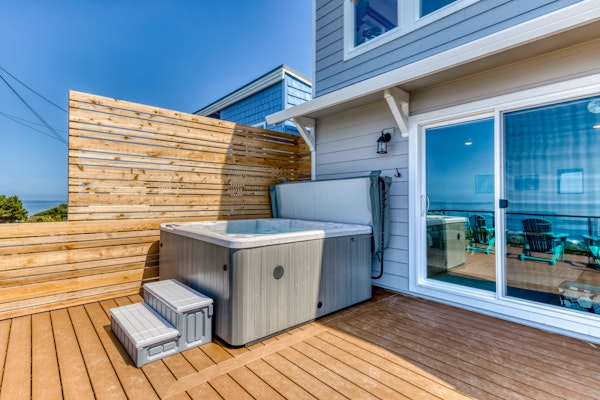 Oceanfront dog friendly home with hot tub and huge view steps to beach access