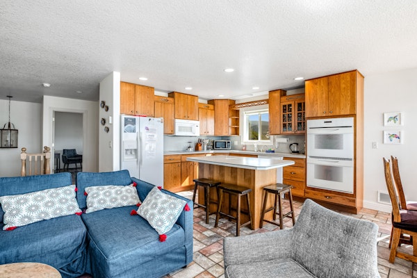 Waterfront dog friendly home a few steps from the beach with hot tub