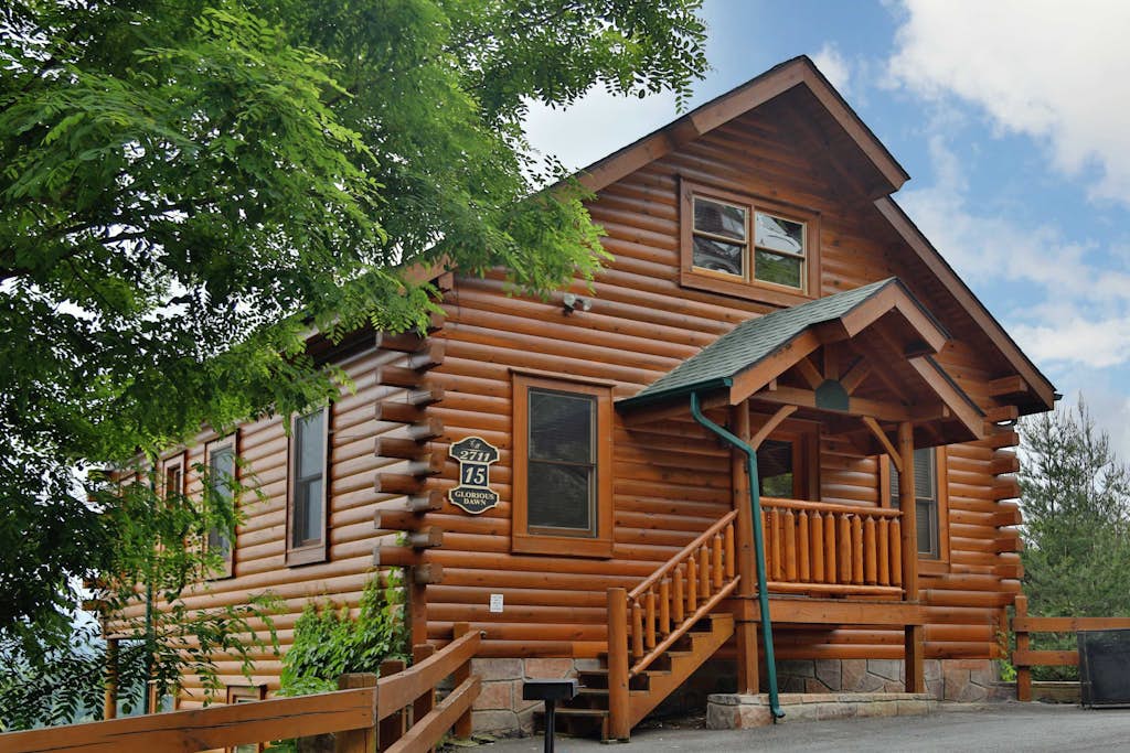 Unwind in mountain luxury at this cozy retreat in Legacy Mountain Resort, your perfect base to explore Sevierville, Pigeon Forge, and Gatlinburg. Enjoy breathtaking Smoky Mountain views from the deck, soak in your private hot tub, or relax by the electric fireplace. With a game room featuring a pool table, arcade, and card table, plus two living areas with Smart Roku TVs, a jacuzzi tub, a fully equipped kitchen, and pet-friendly comfort (fee applies), this cabin sleeps 8 in style.