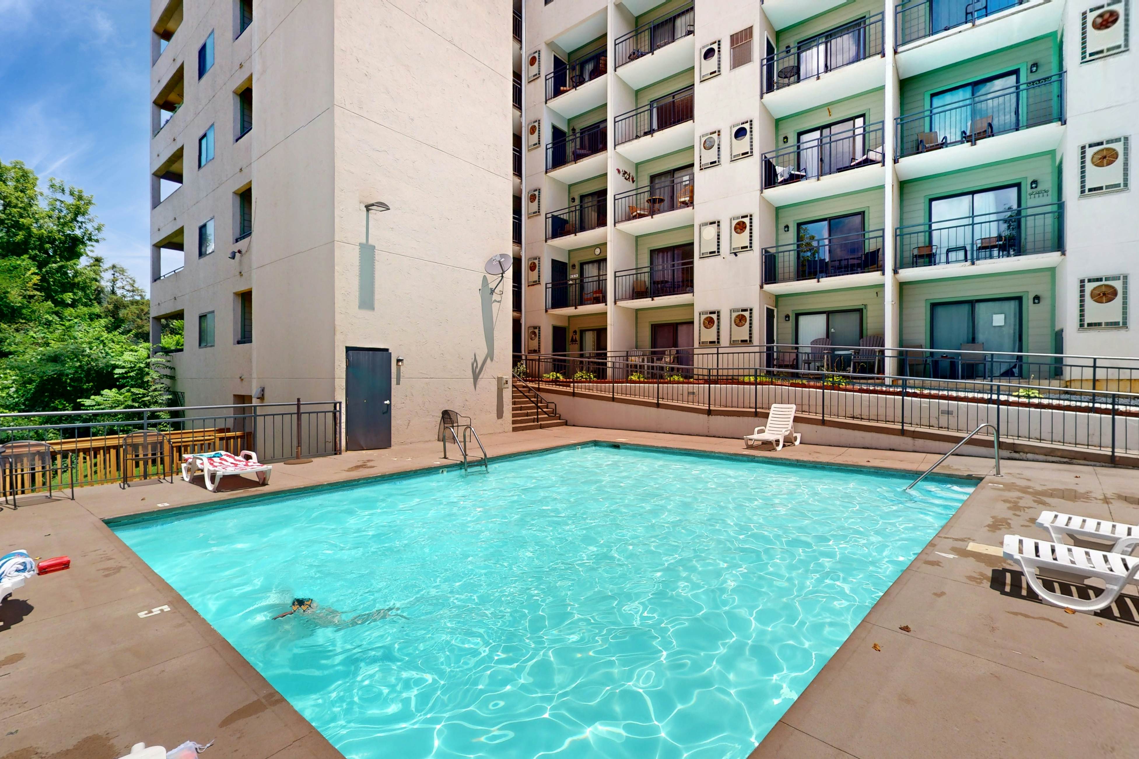 Inviting condo w/ free attraction tickets, views, pool, fireplace, & balcony