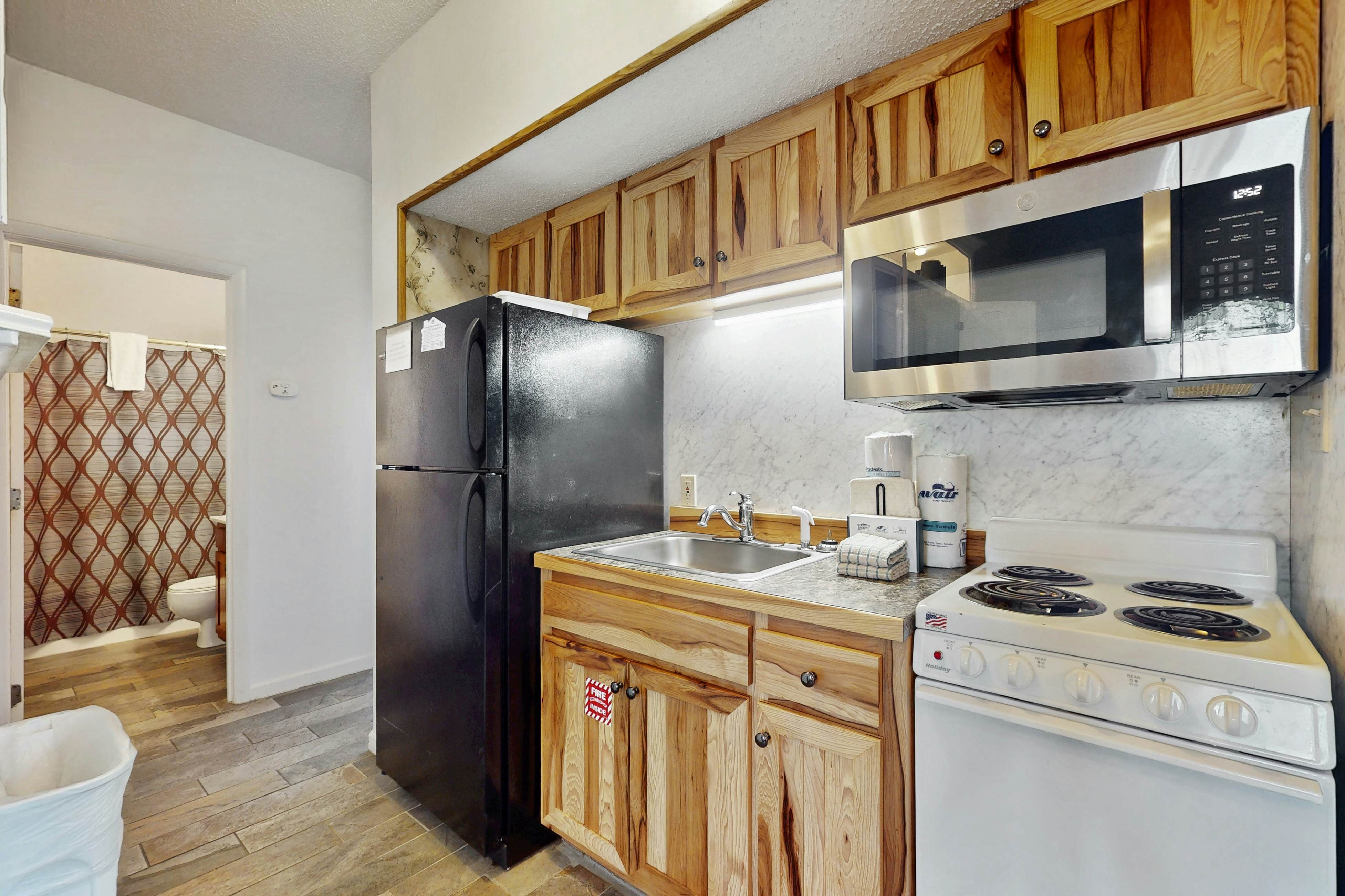 Inviting condo w/ free attraction tickets, views, pool, fireplace, & balcony