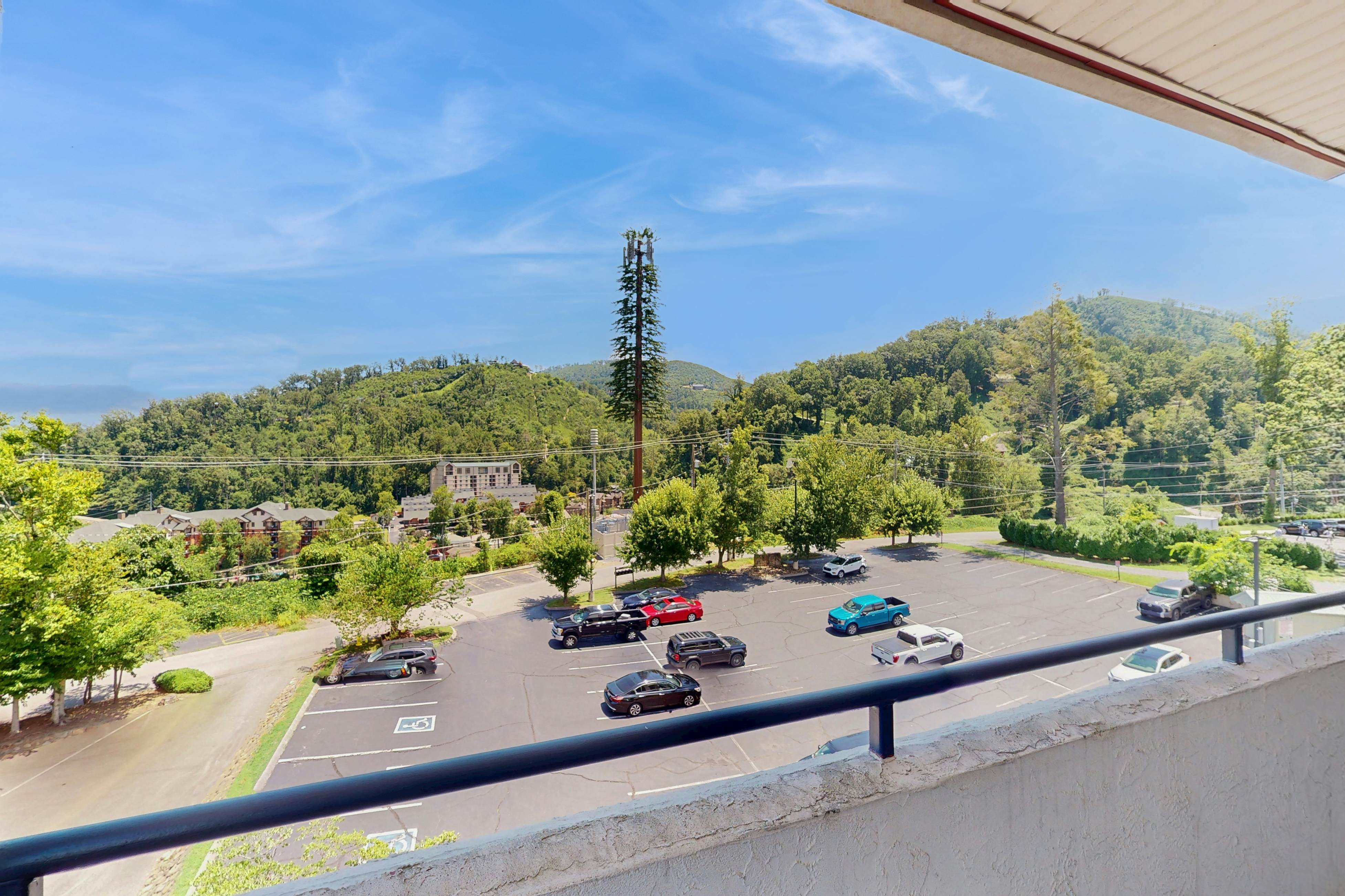 Inviting condo w/ free attraction tickets, views, pool, fireplace, & balcony