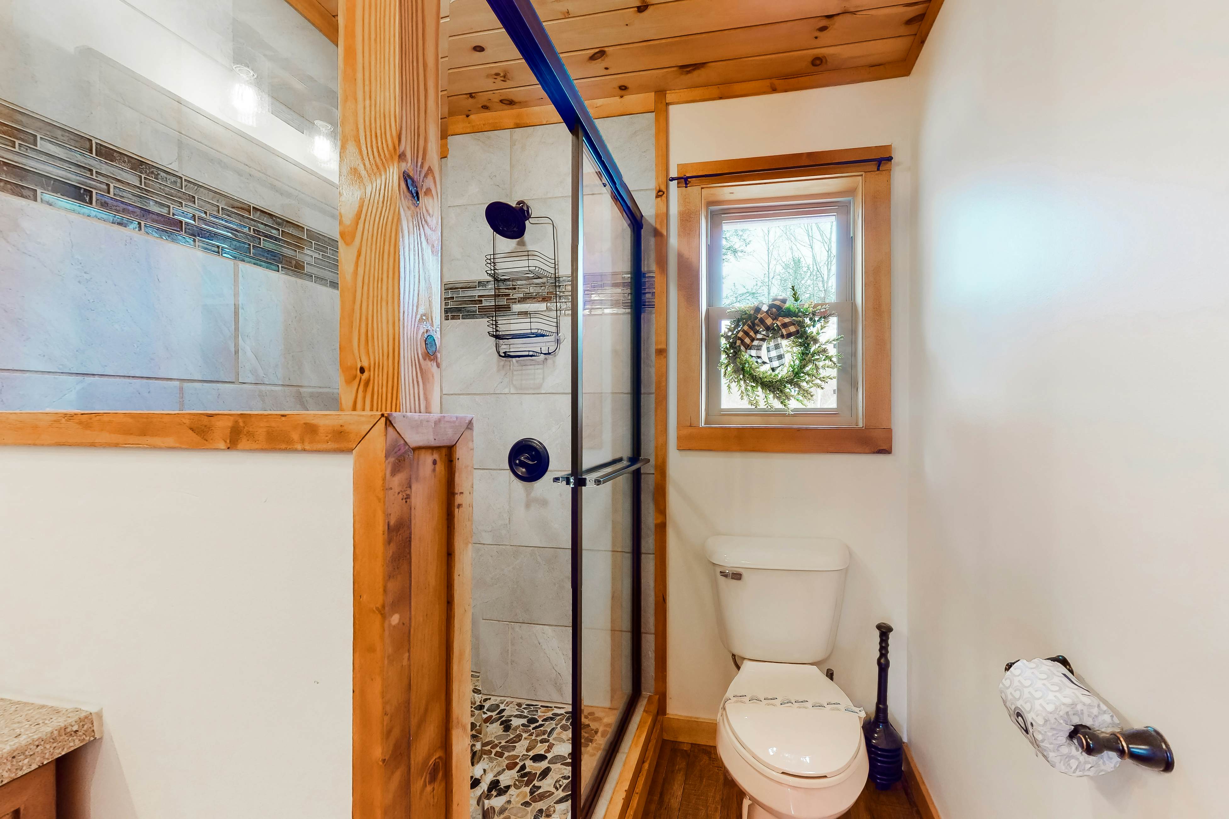 Dog-friendly lakefront house with hot tub, central AC, & mountain view