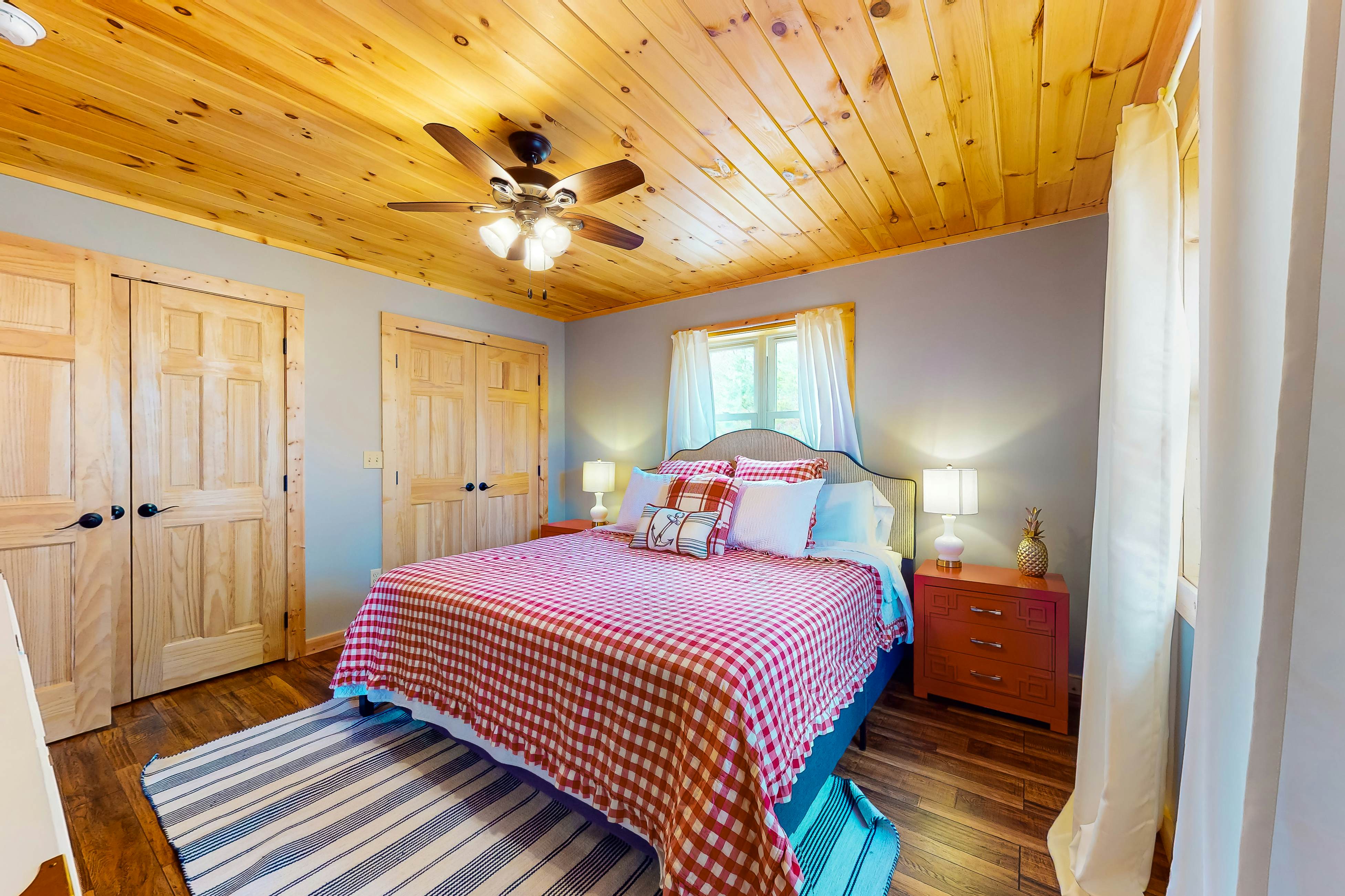 Dog-friendly lakefront house with hot tub, central AC, & mountain view