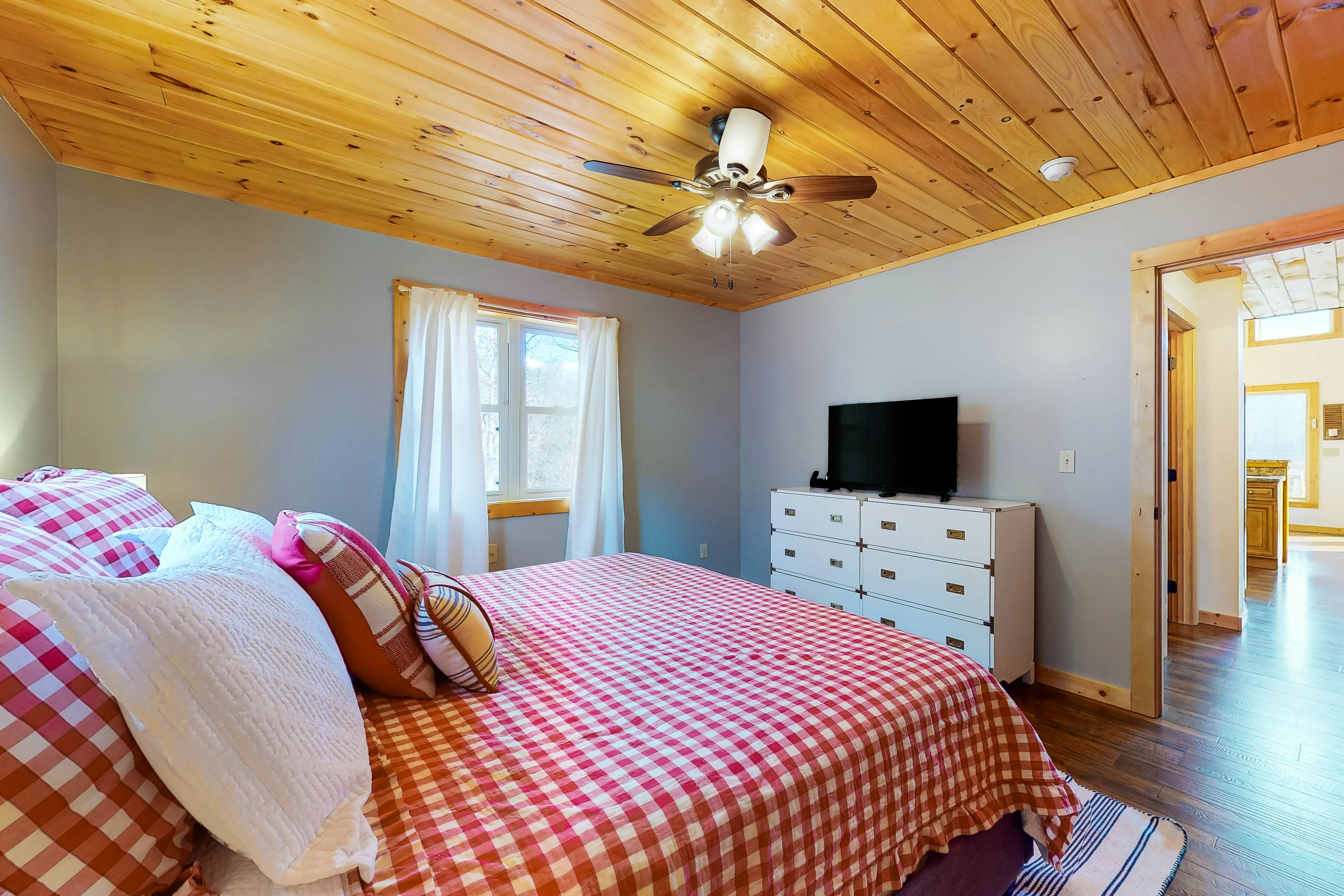 Dog-friendly lakefront house with hot tub, central AC, & mountain view