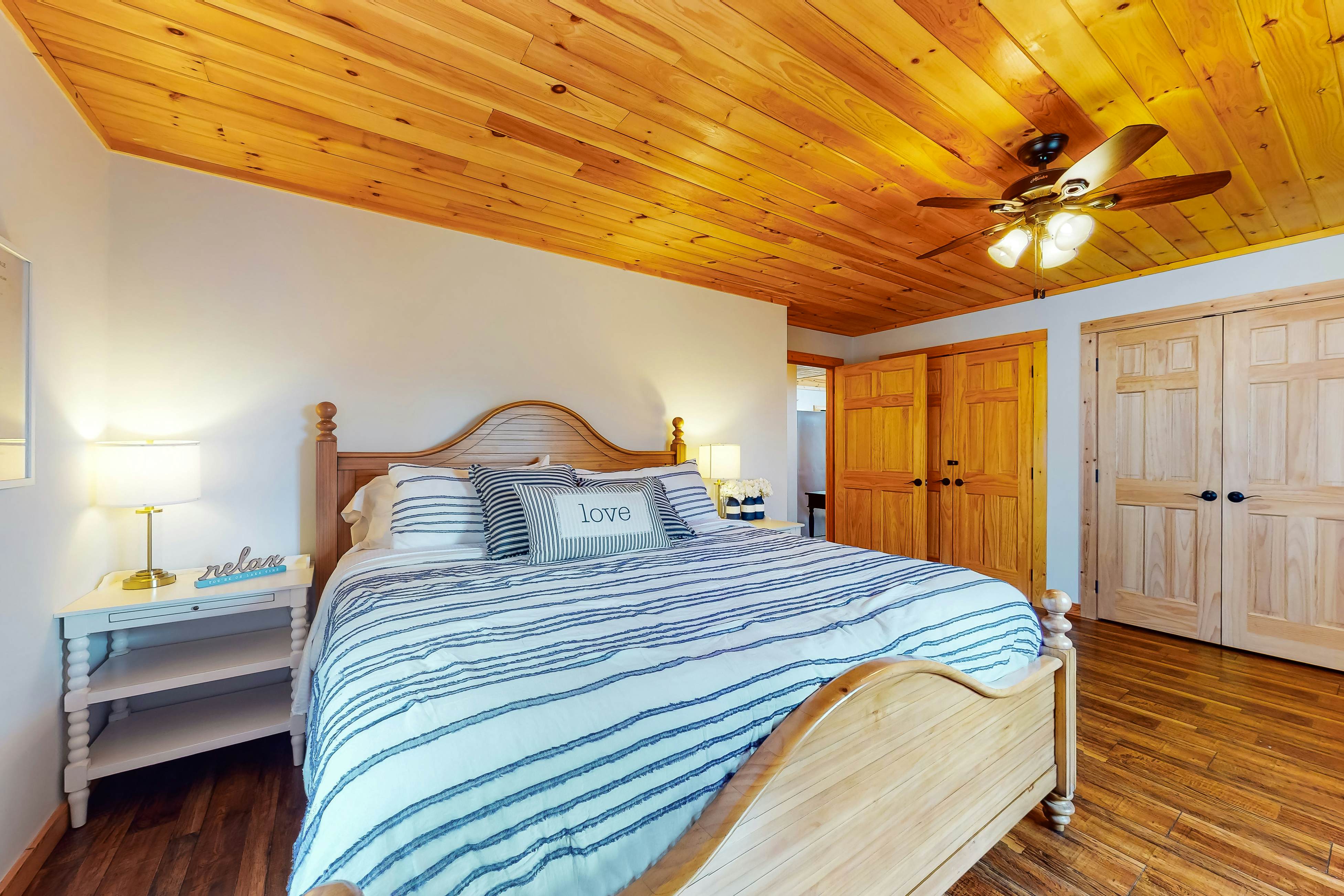 Dog-friendly lakefront house with hot tub, central AC, & mountain view