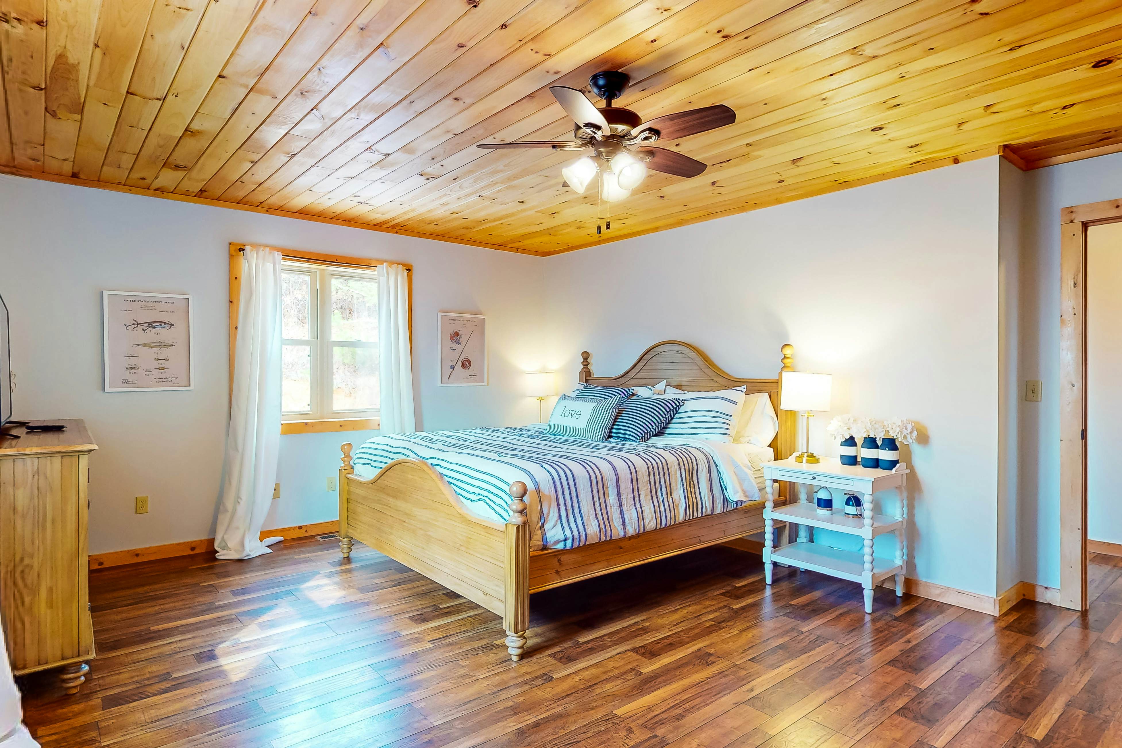 Dog-friendly lakefront house with hot tub, central AC, & mountain view