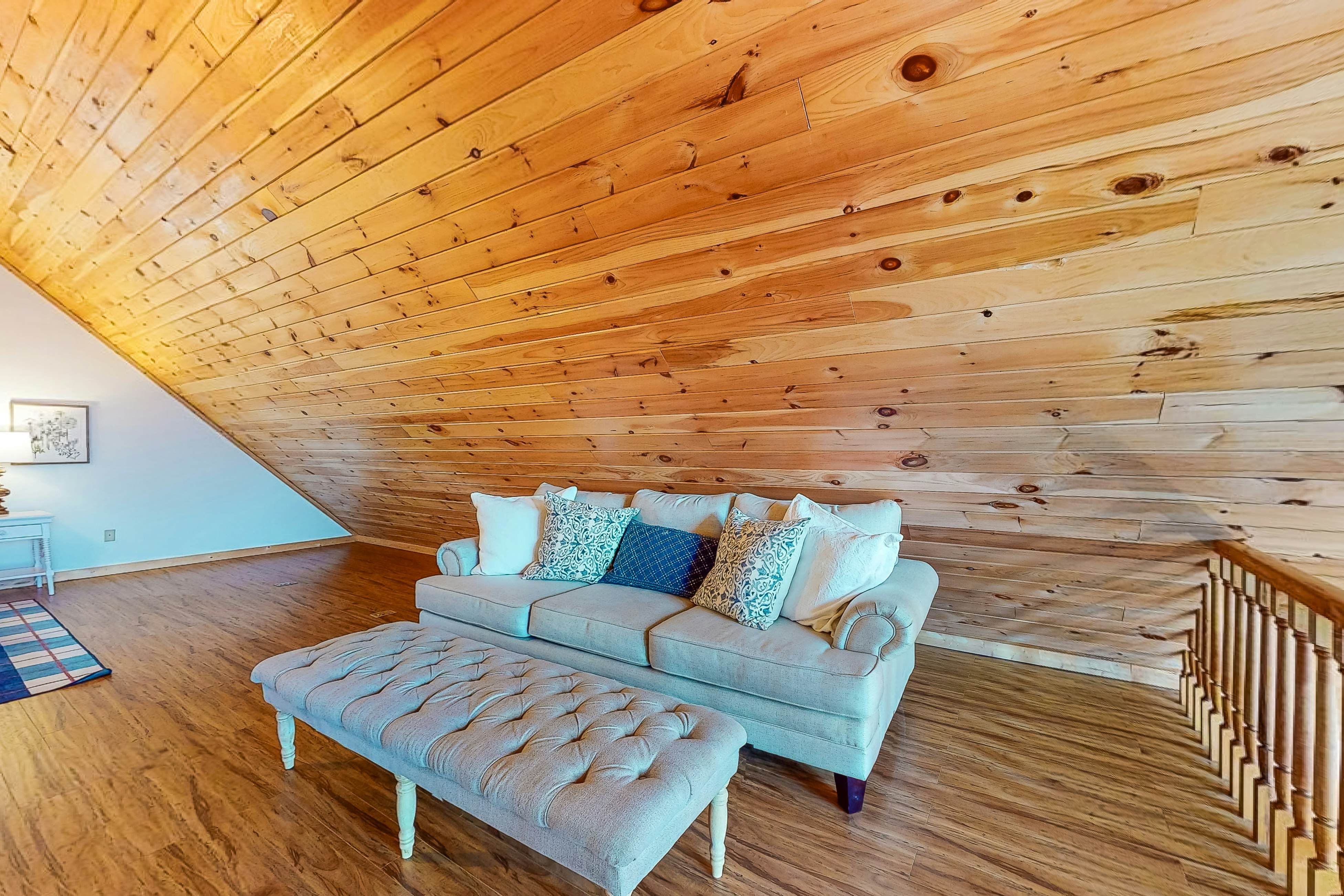 Dog-friendly lakefront house with hot tub, central AC, & mountain view