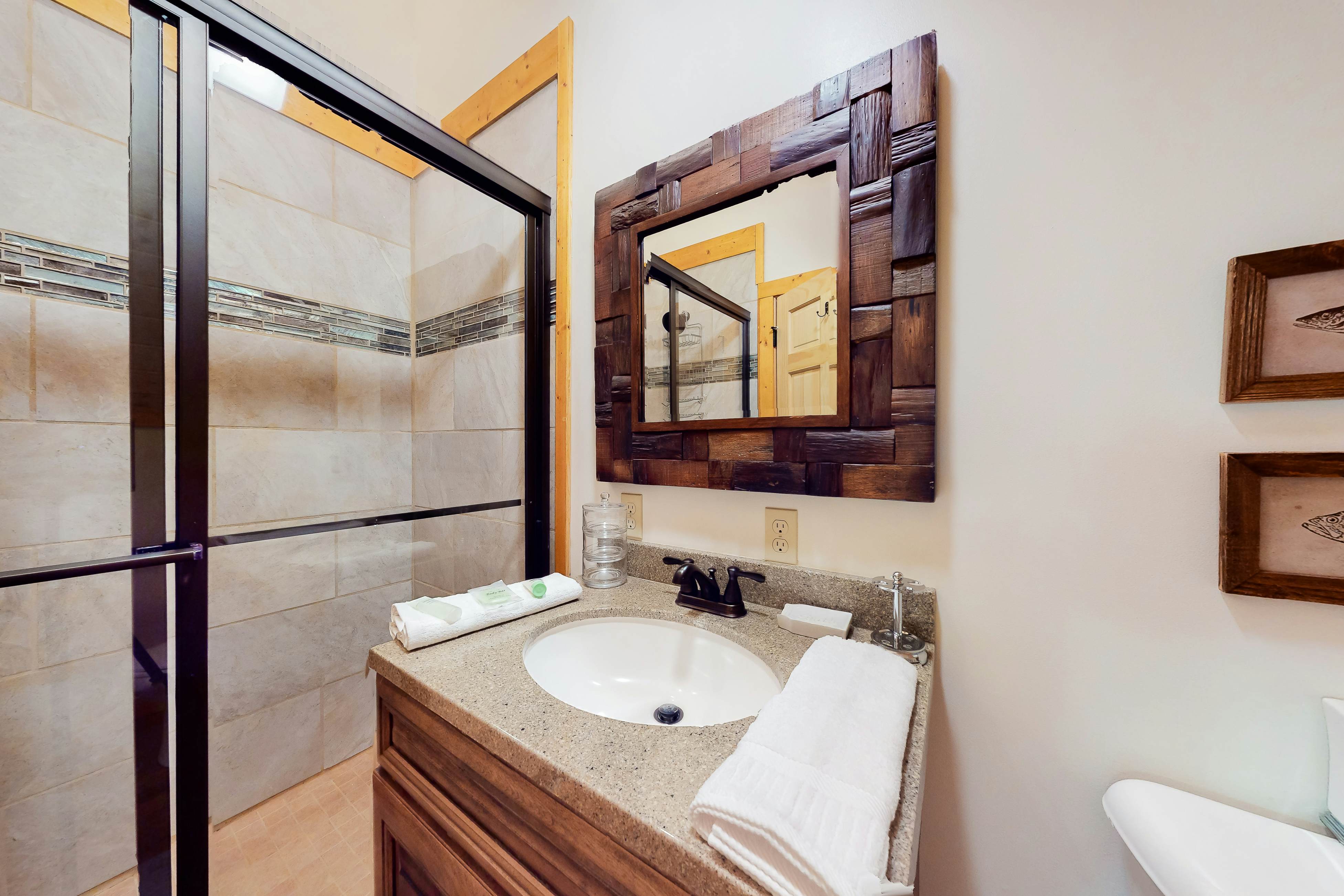 Dog-friendly lakefront house with hot tub, central AC, & mountain view