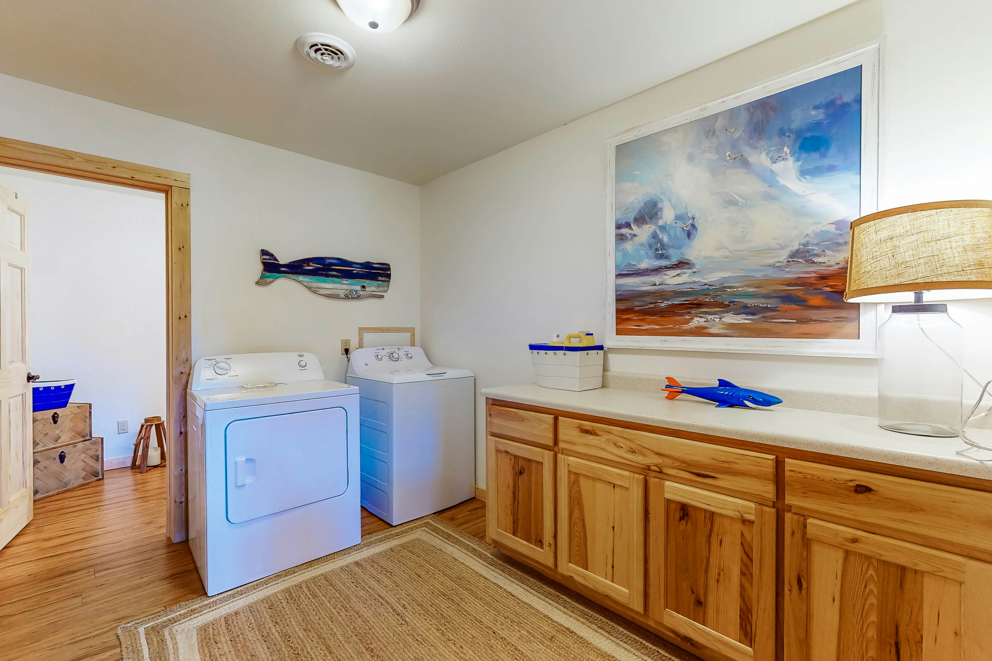 Dog-friendly lakefront house with hot tub, central AC, & mountain view