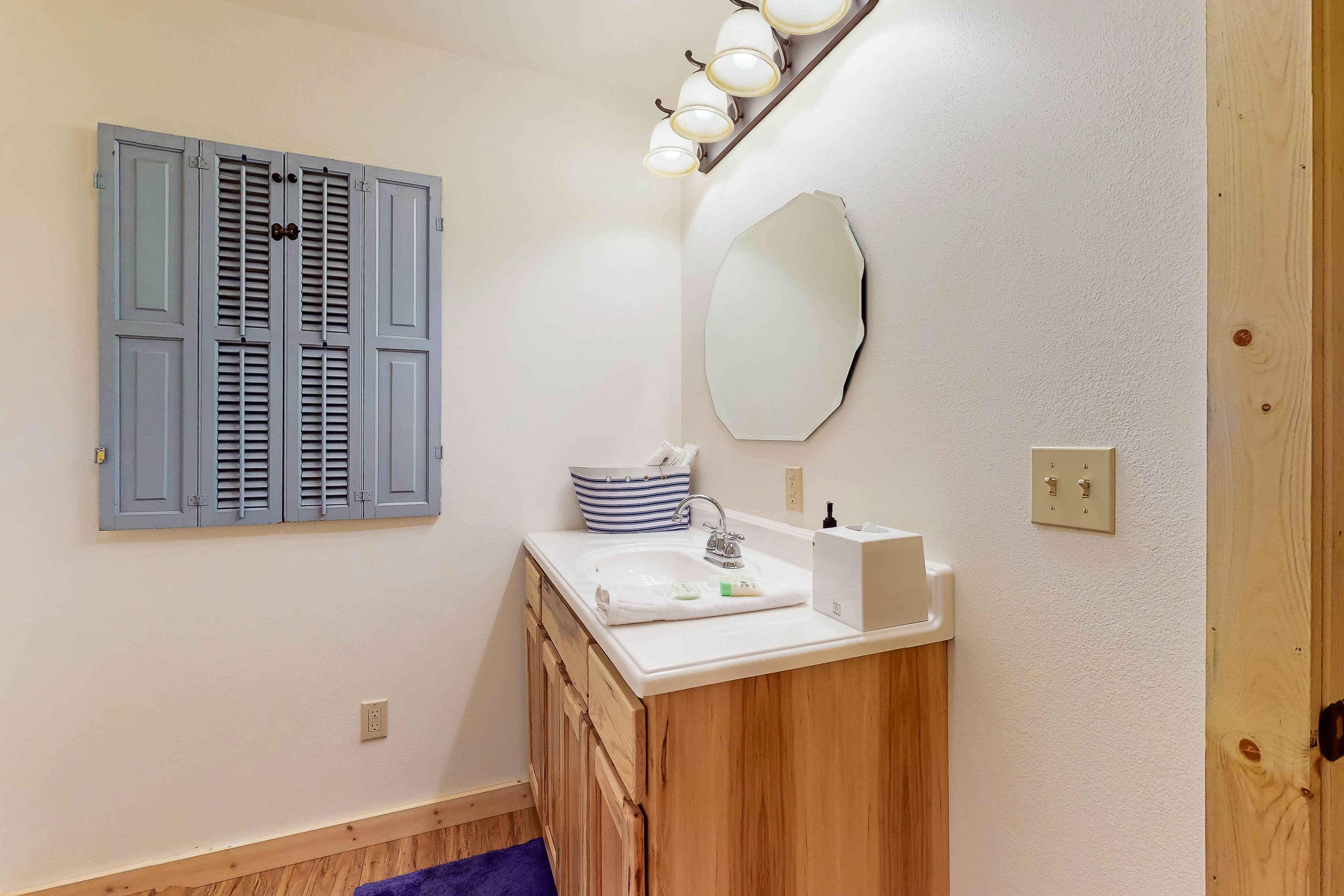 Dog-friendly lakefront house with hot tub, central AC, & mountain view