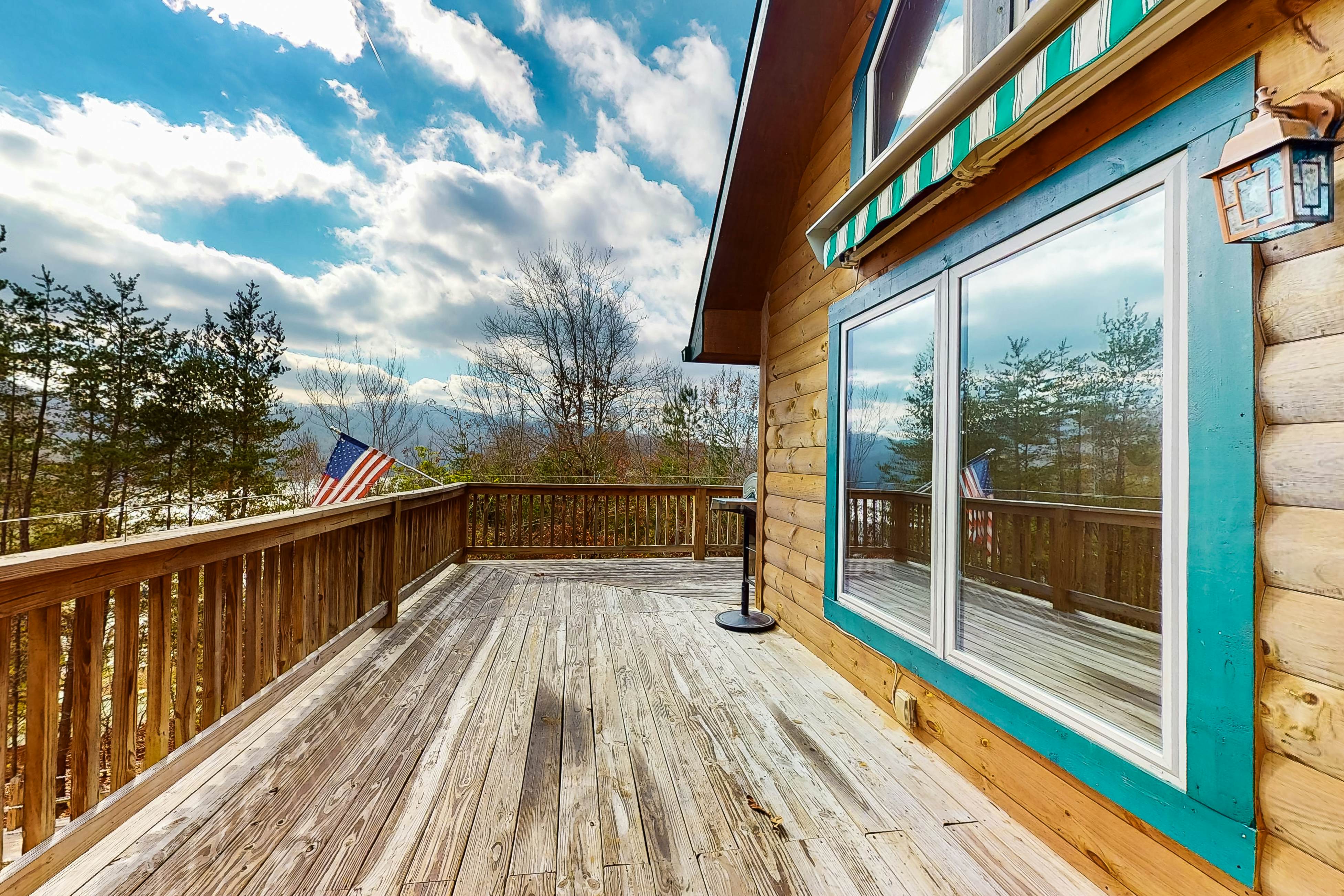 Dog-friendly lakefront house with hot tub, central AC, & mountain view