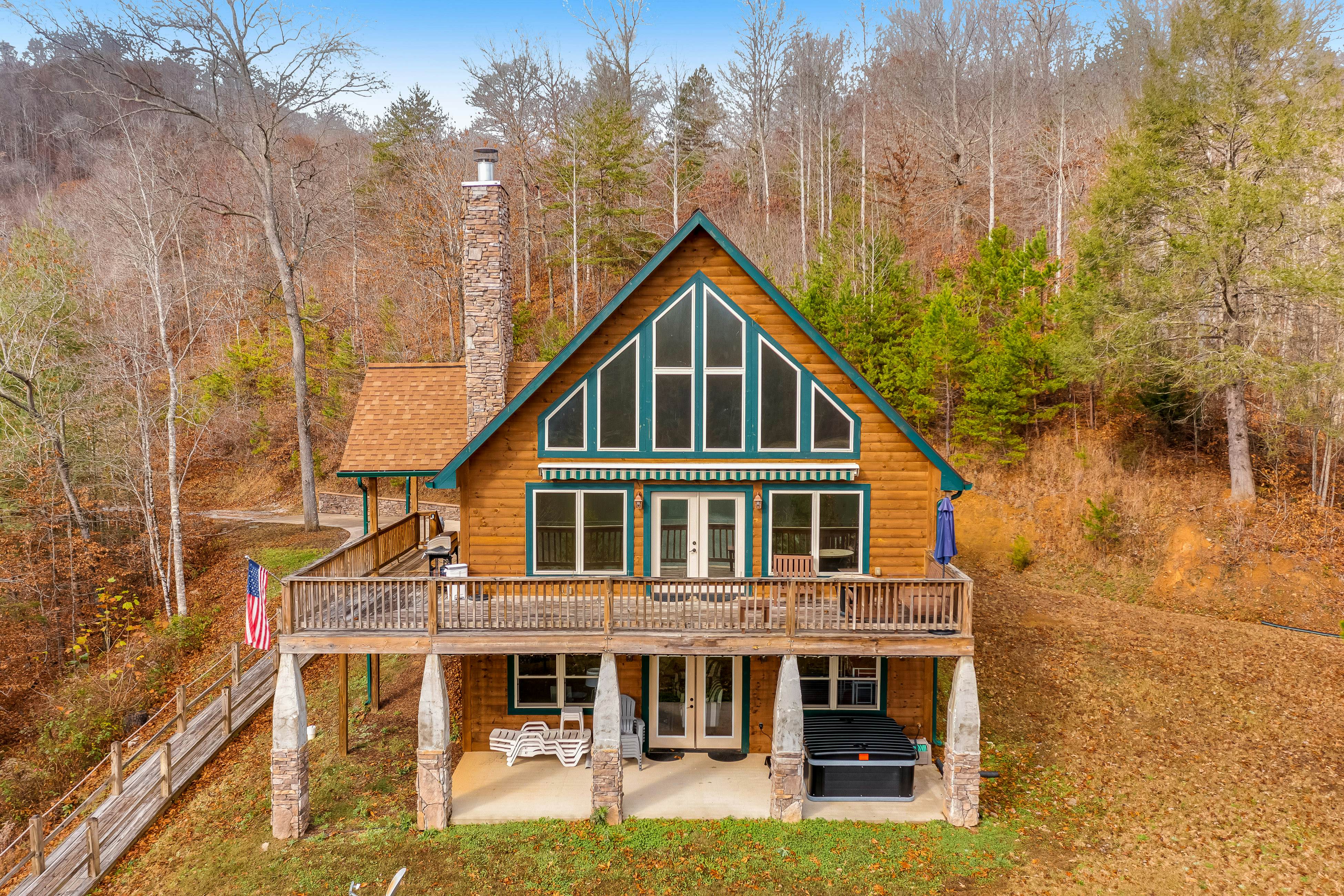 Dog-friendly lakefront house with hot tub, central AC, & mountain view