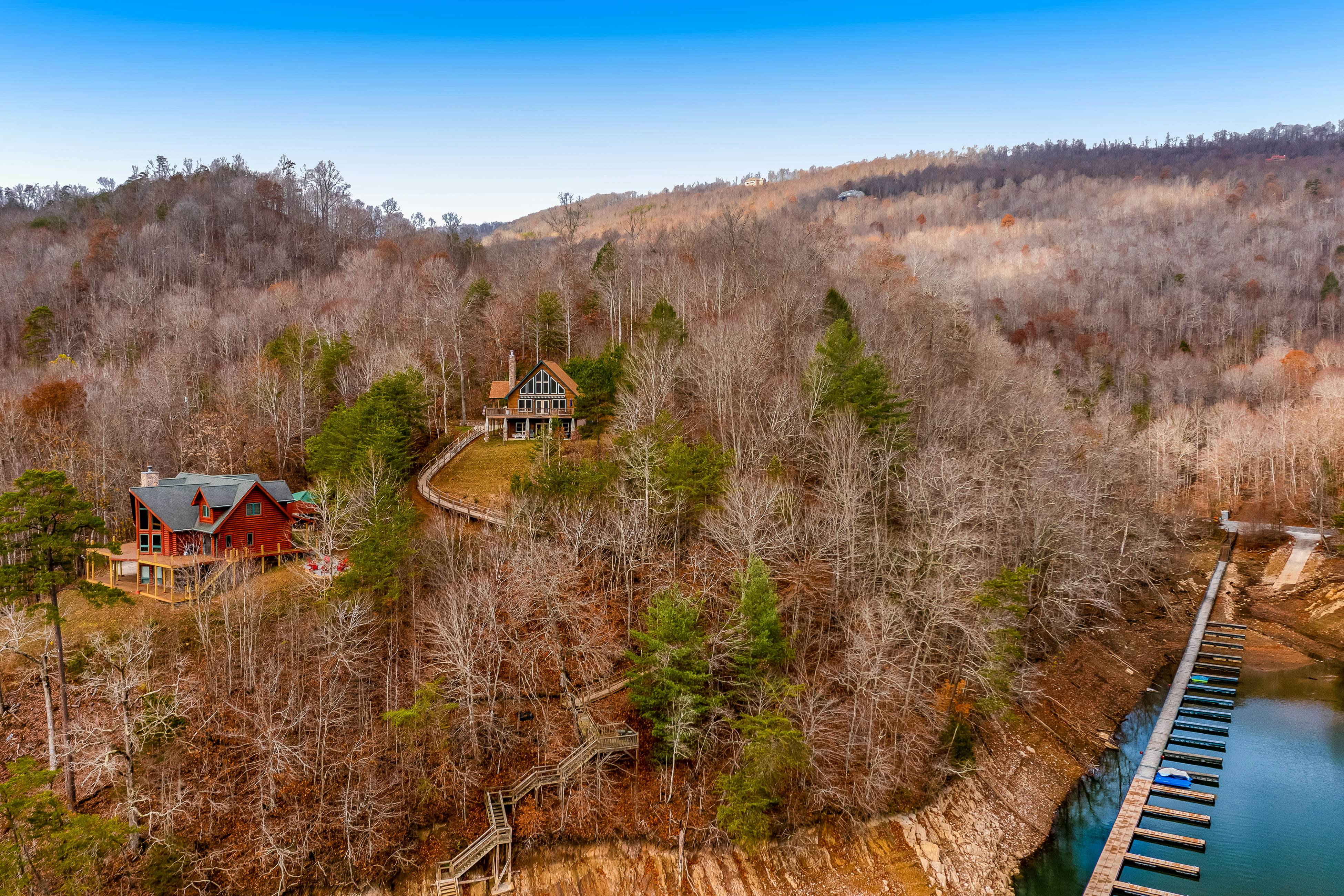 Dog-friendly lakefront house with hot tub, central AC, & mountain view