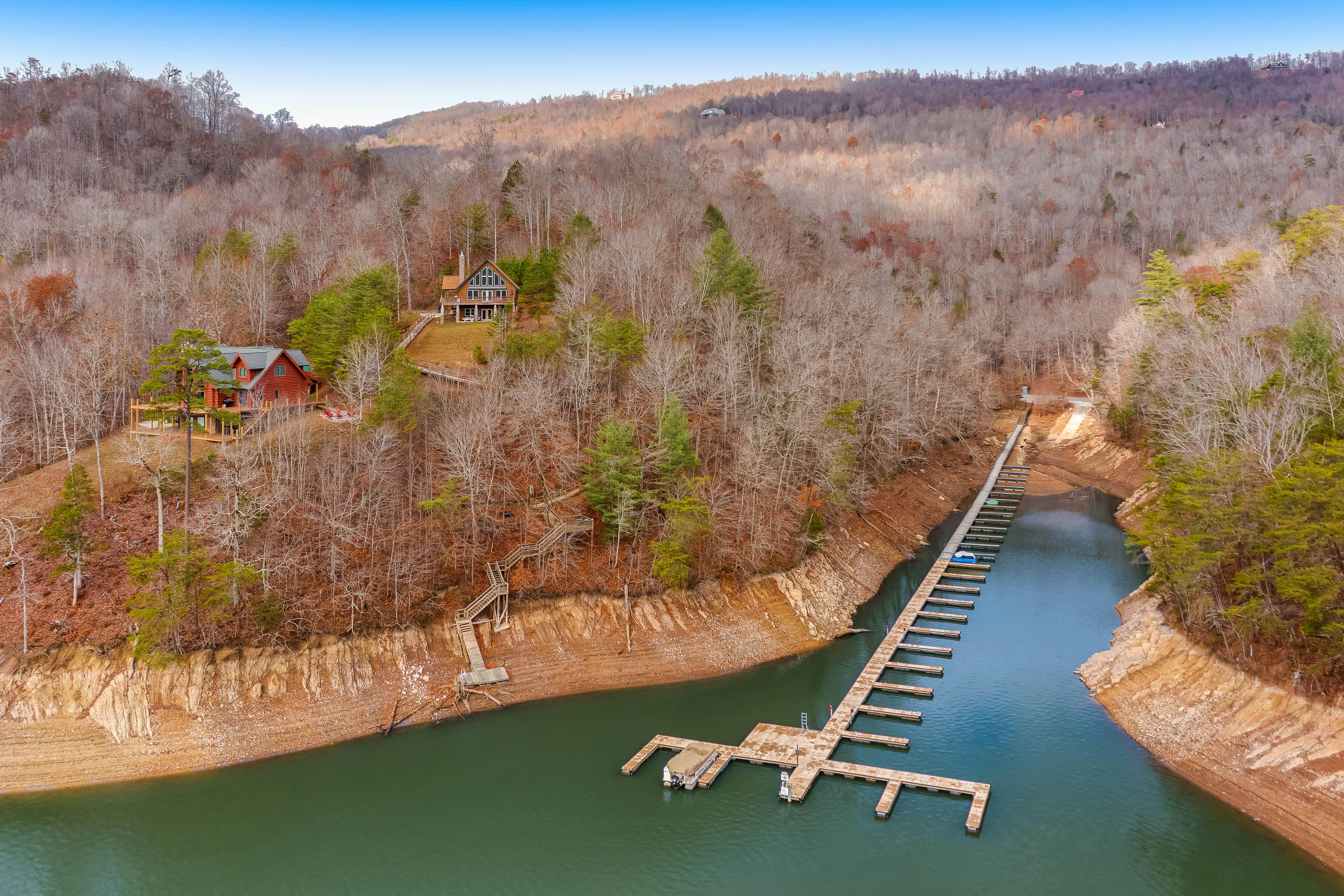 Dog-friendly lakefront house with hot tub, central AC, & mountain view