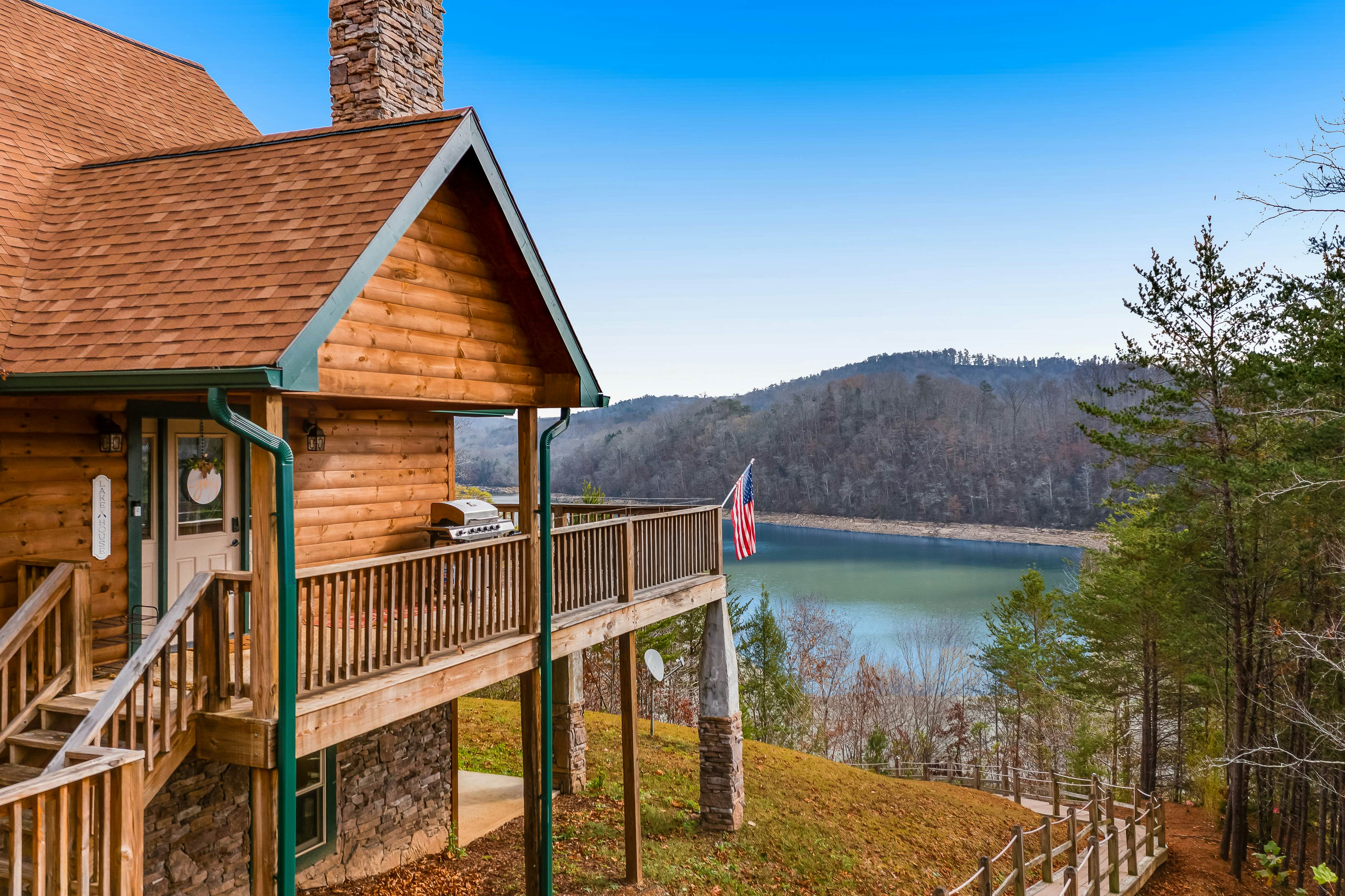 Dog-friendly lakefront house with hot tub, central AC, & mountain view