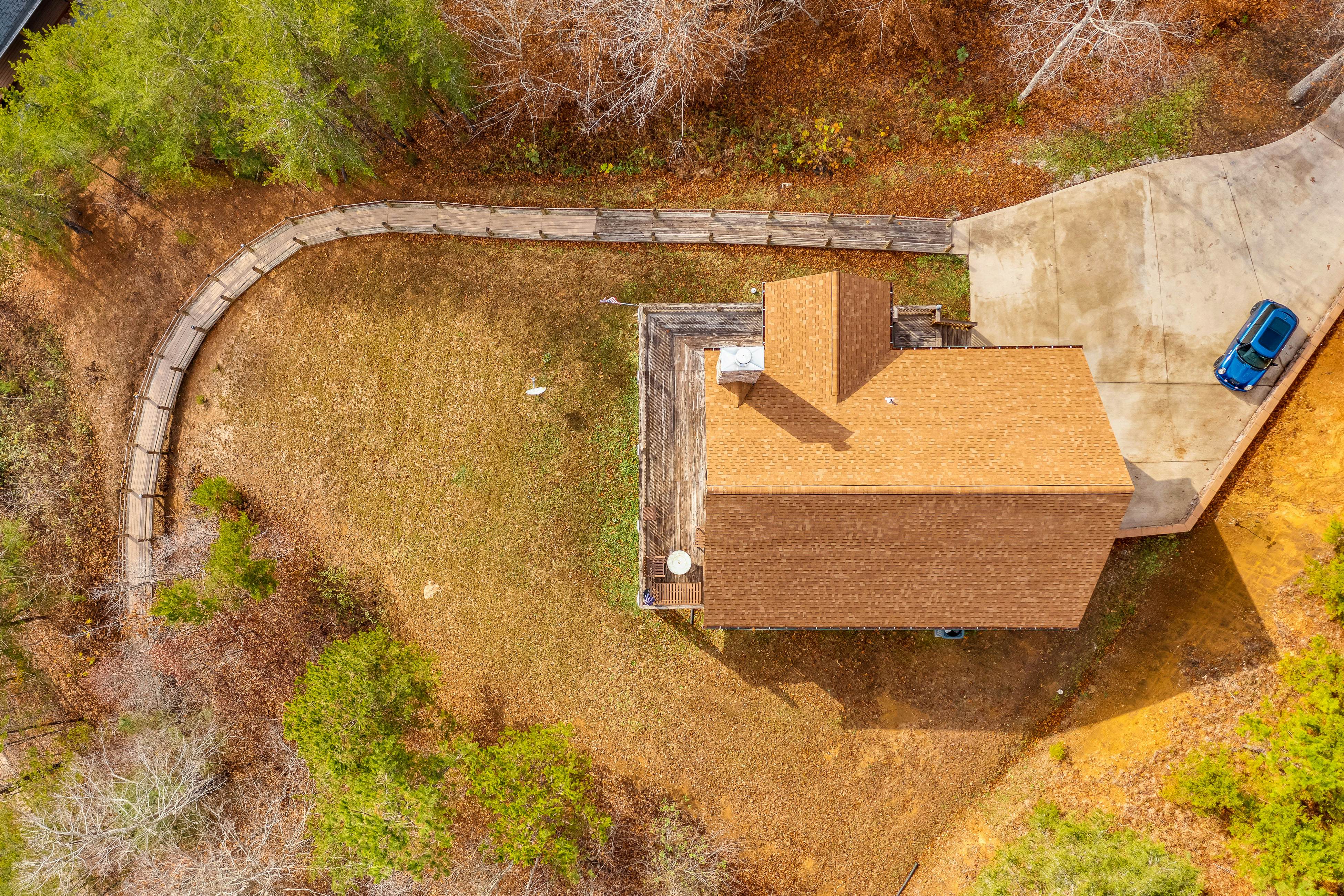 Dog-friendly lakefront house with hot tub, central AC, & mountain view