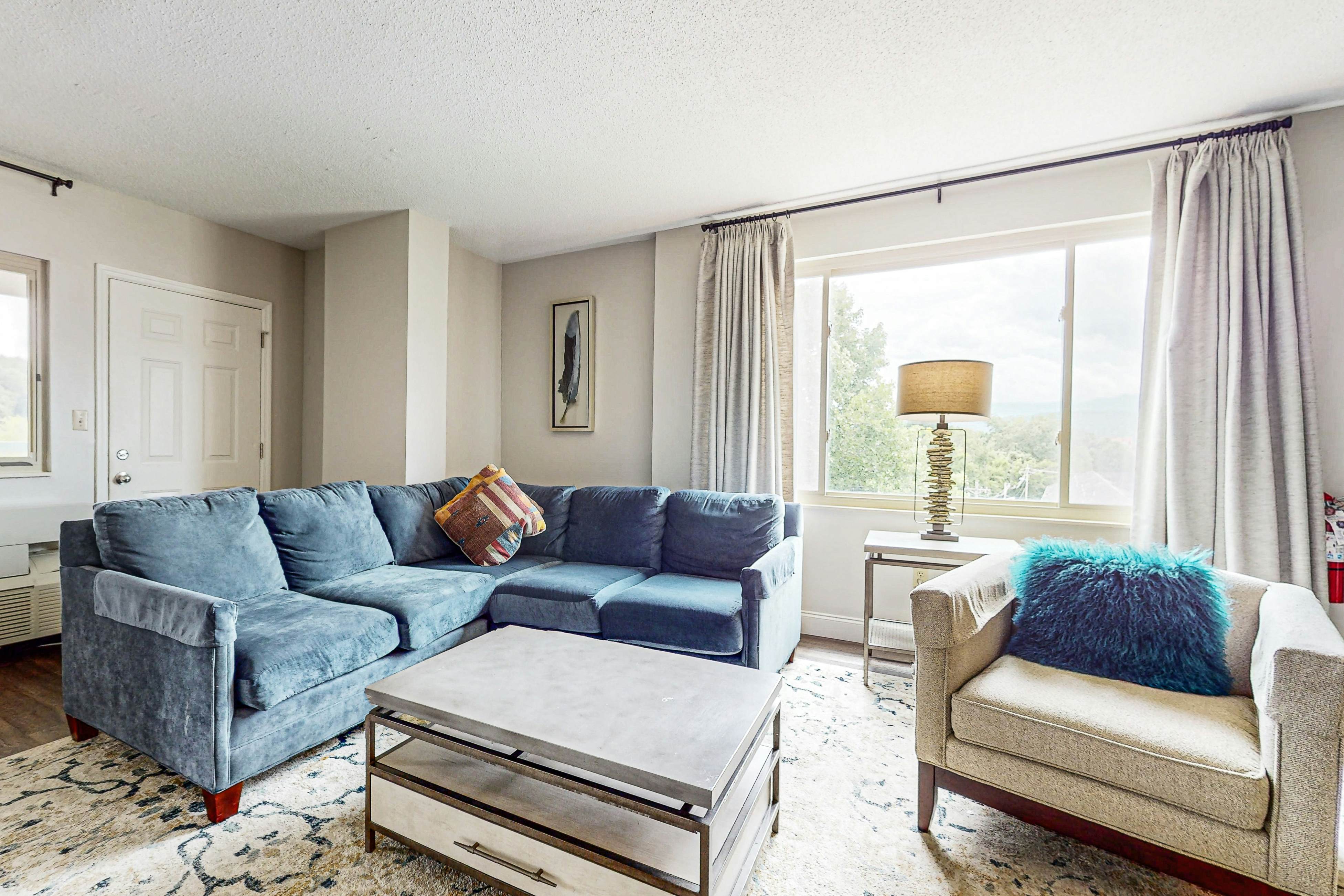 Stylish Riverview Corner Unit with Free Attraction Tickets, Balcony, & Fireplace