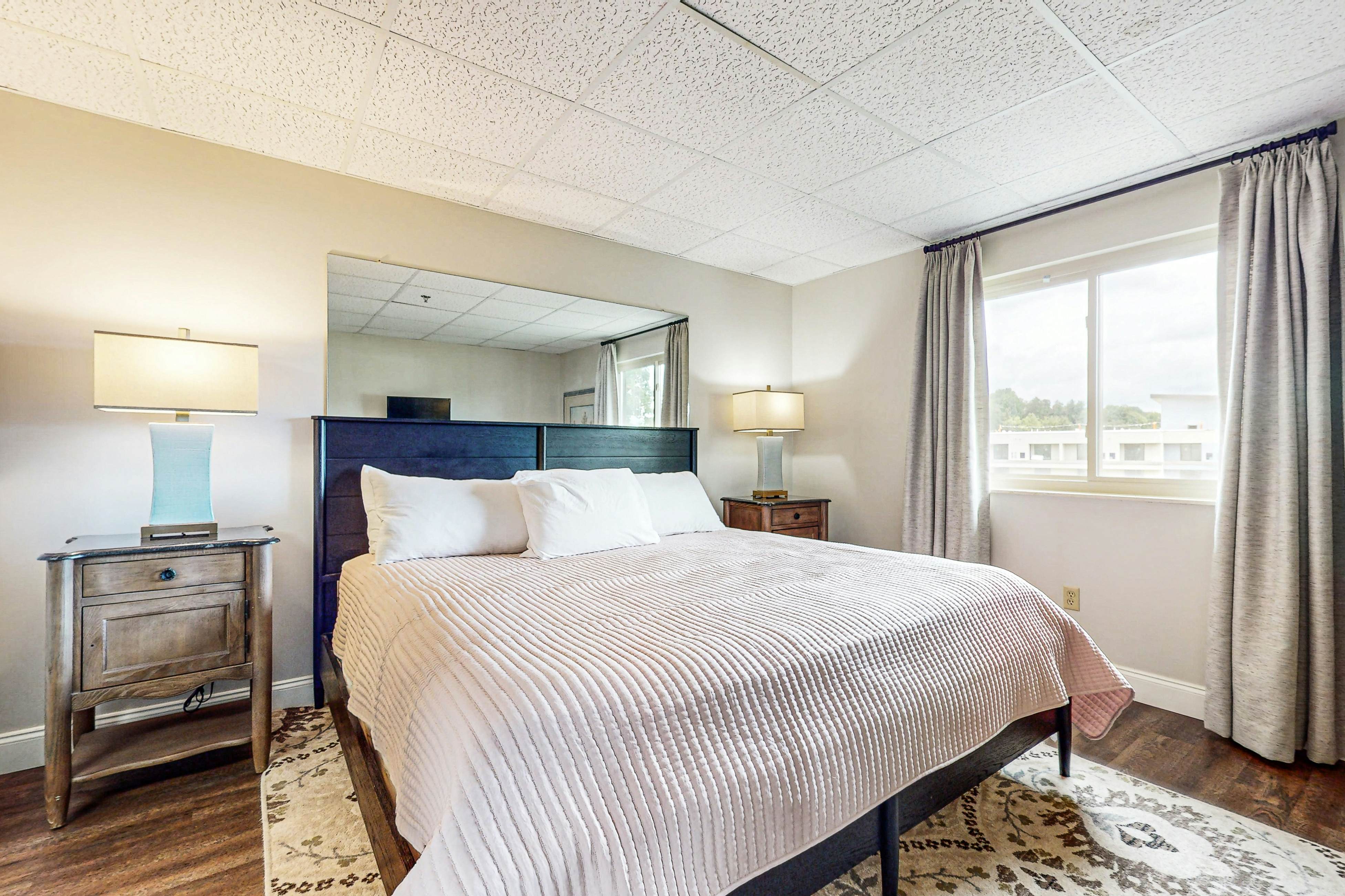 Stylish Riverview Corner Unit with Free Attraction Tickets, Balcony, & Fireplace