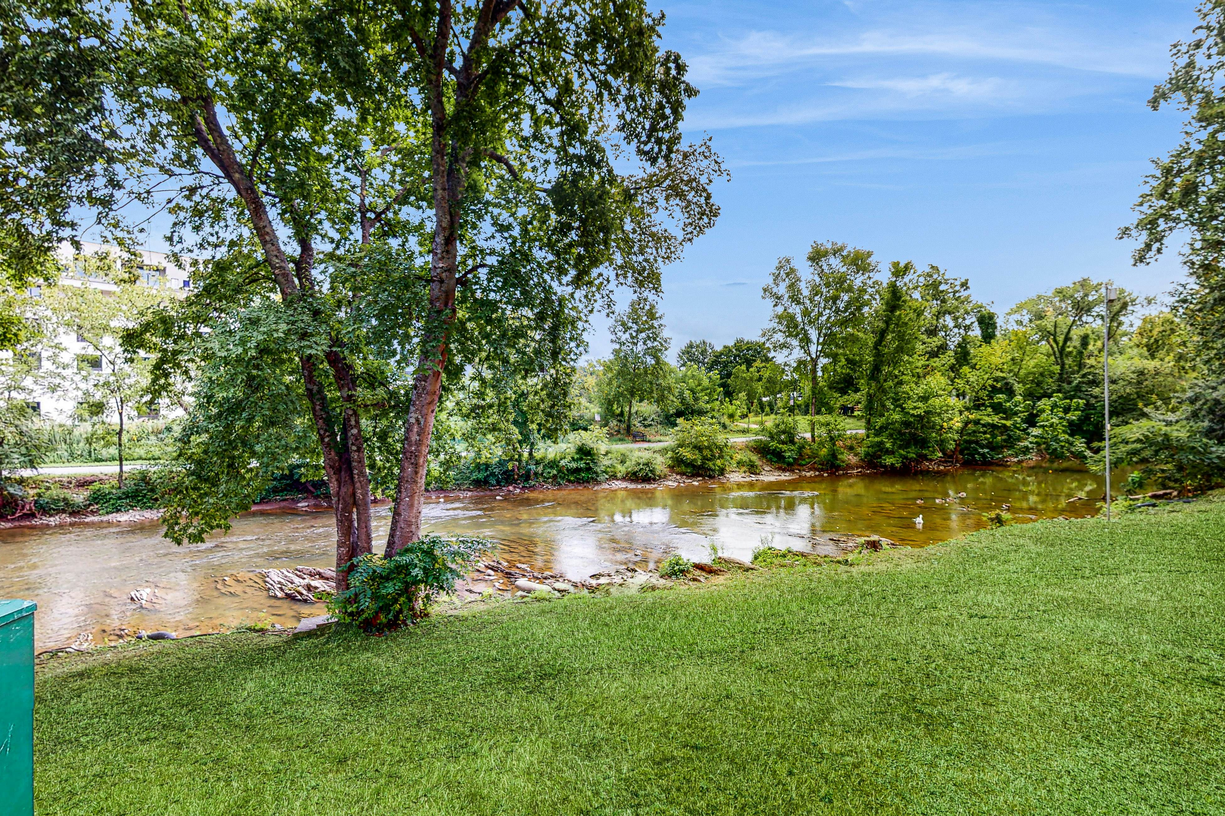 Stylish Riverview Corner Unit with Free Attraction Tickets, Balcony, & Fireplace