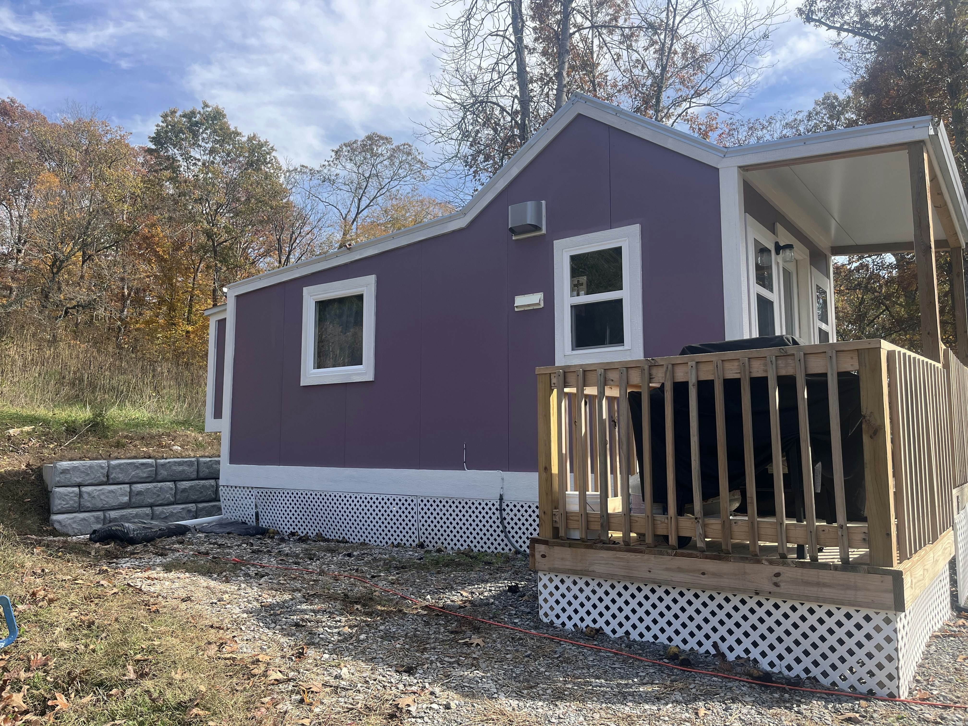 Tiny home studio with kitchenette, grill and front porch