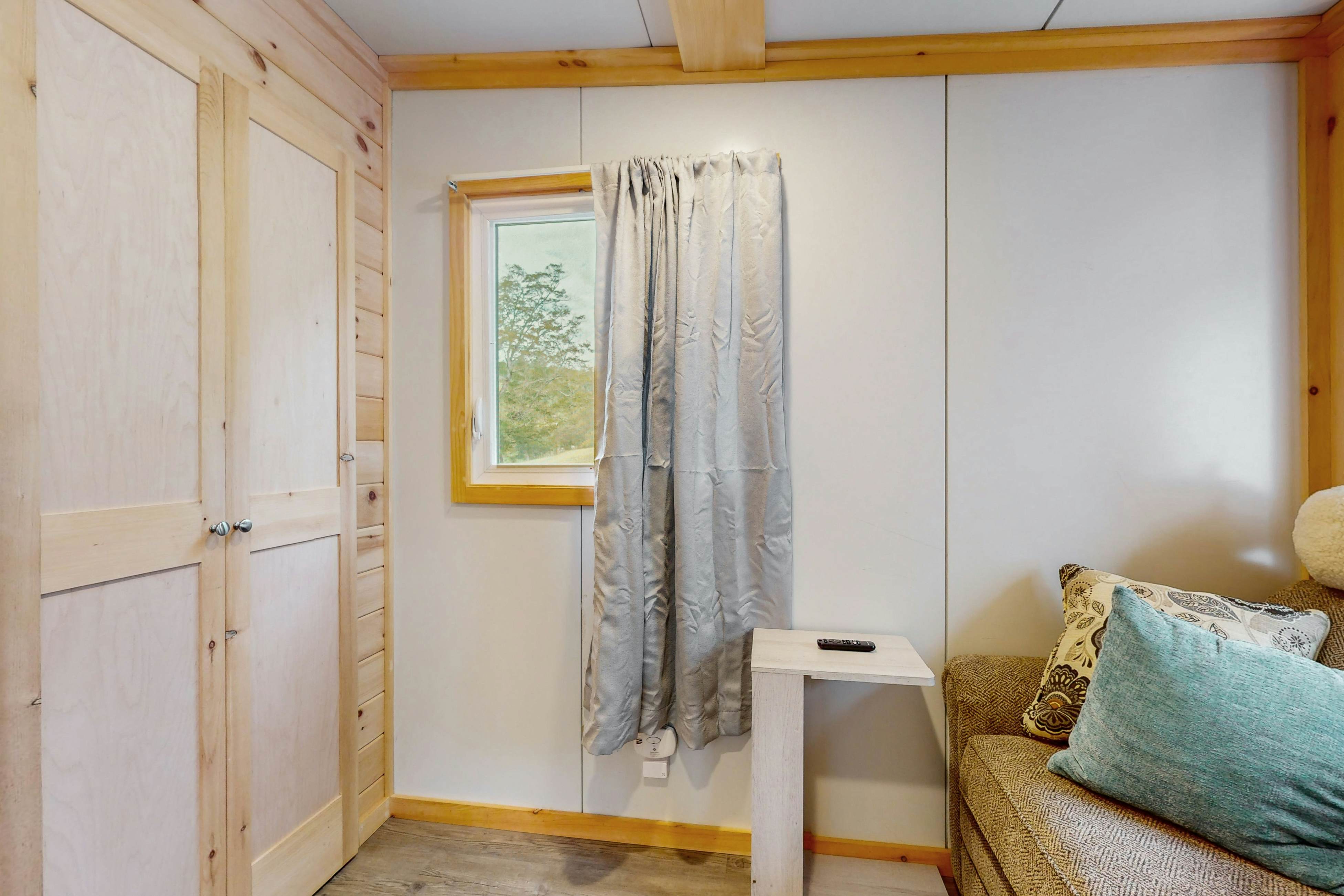 Tiny home studio with kitchenette, grill and front porch
