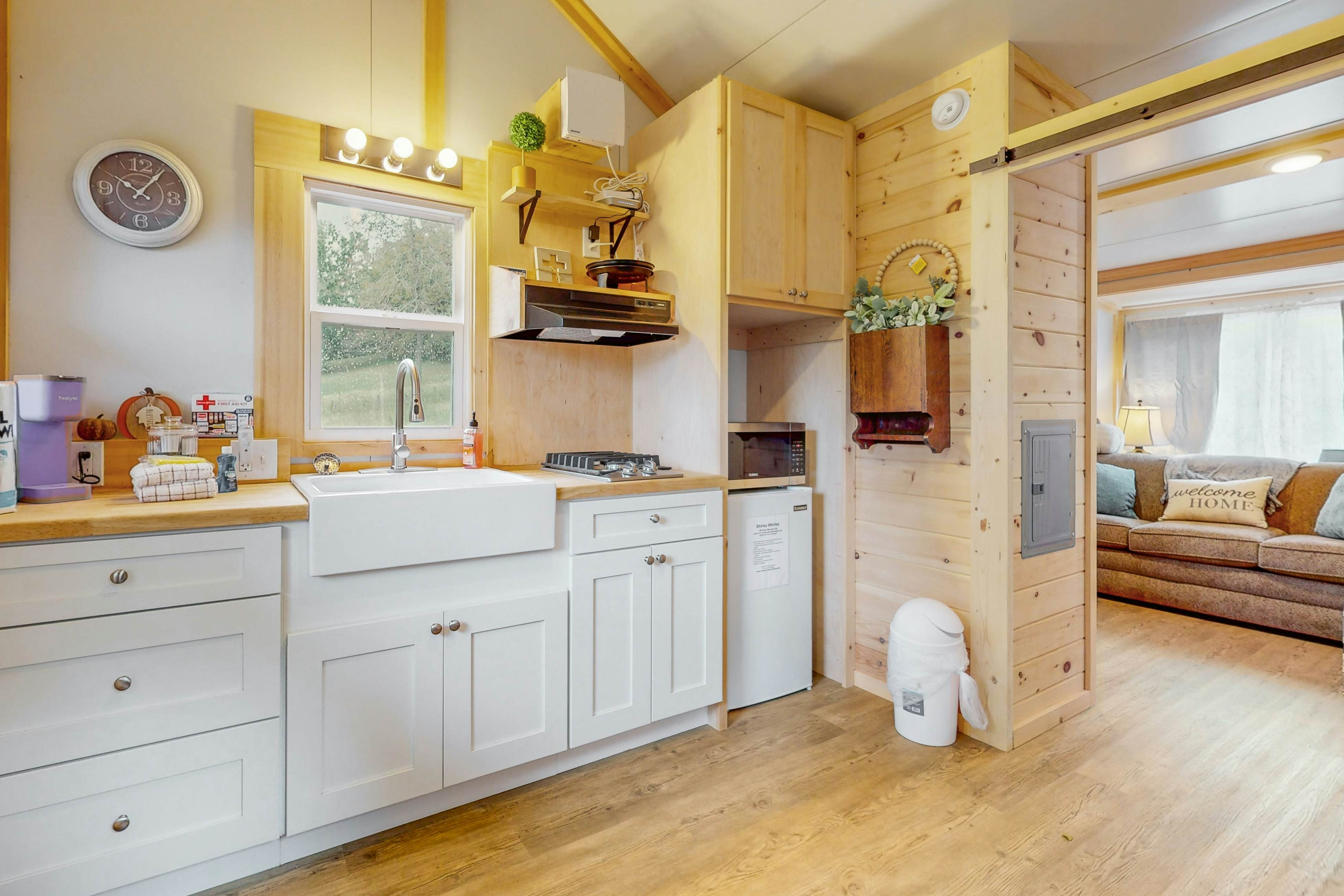 Tiny home studio with kitchenette, grill and front porch
