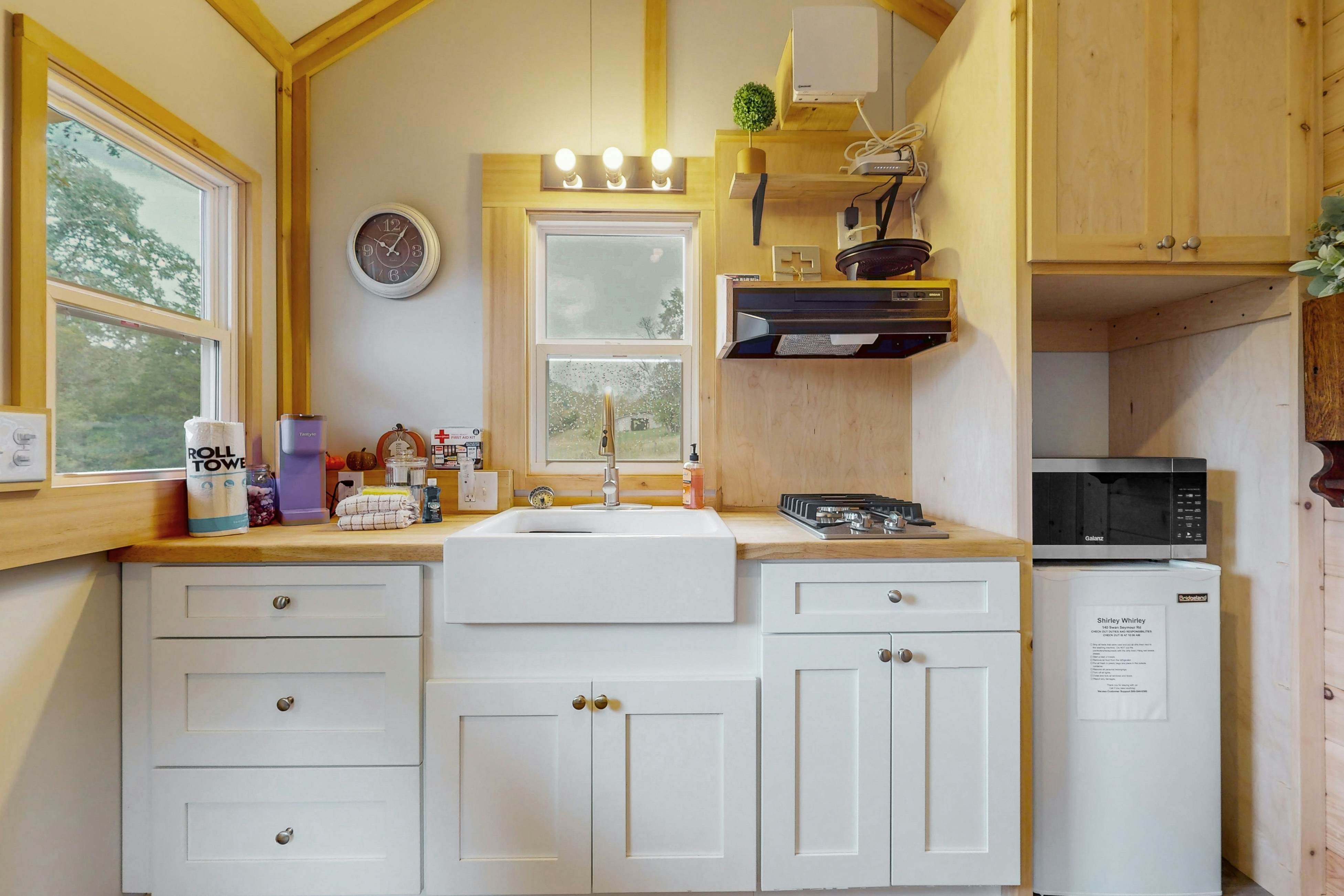 Tiny home studio with kitchenette, grill and front porch