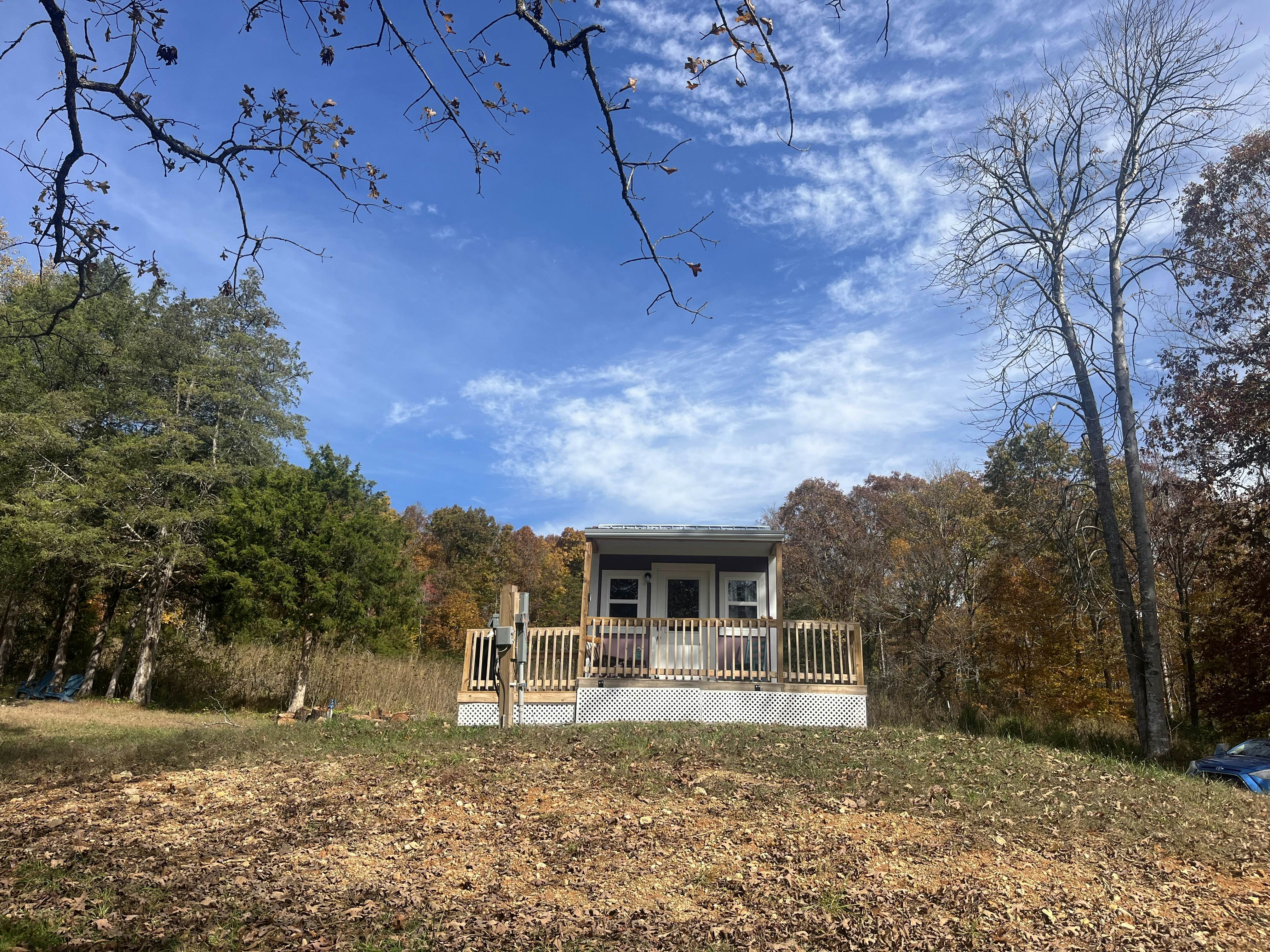 Tiny home studio with kitchenette, grill and front porch