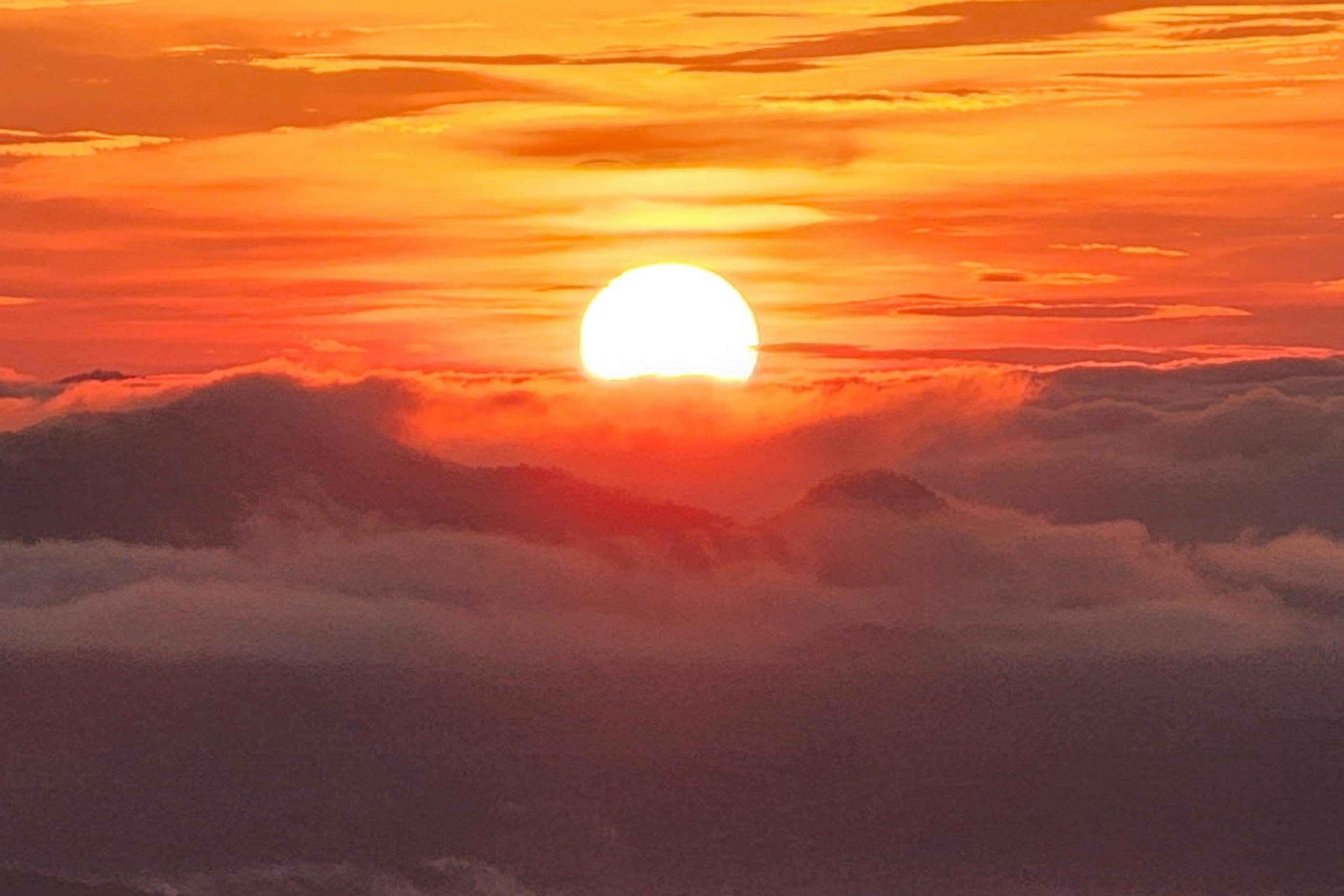 Mountain-view condo with private balcony, pool, & wood-burning fireplace