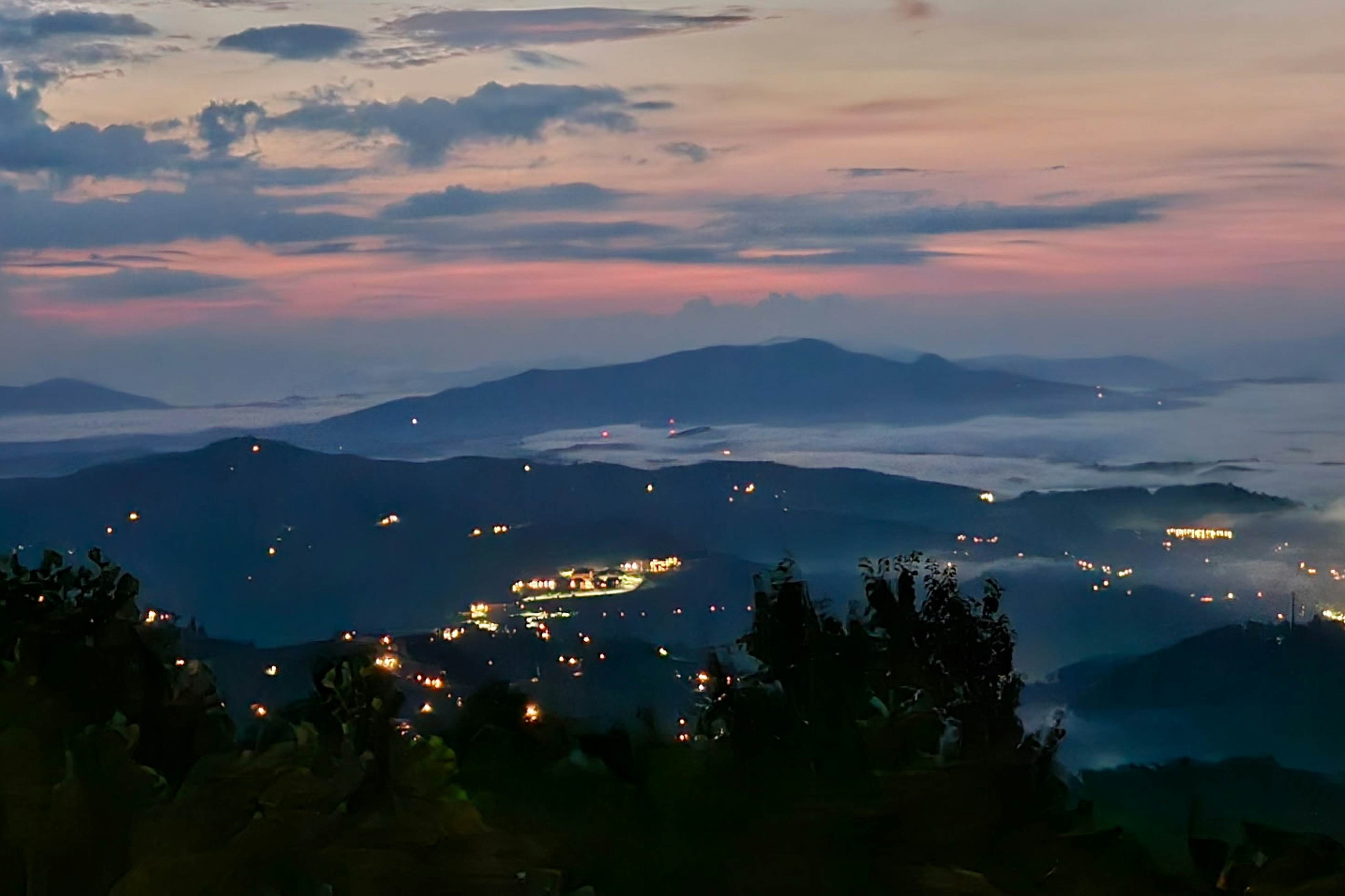 Mountain-view condo with private balcony, pool, & wood-burning fireplace