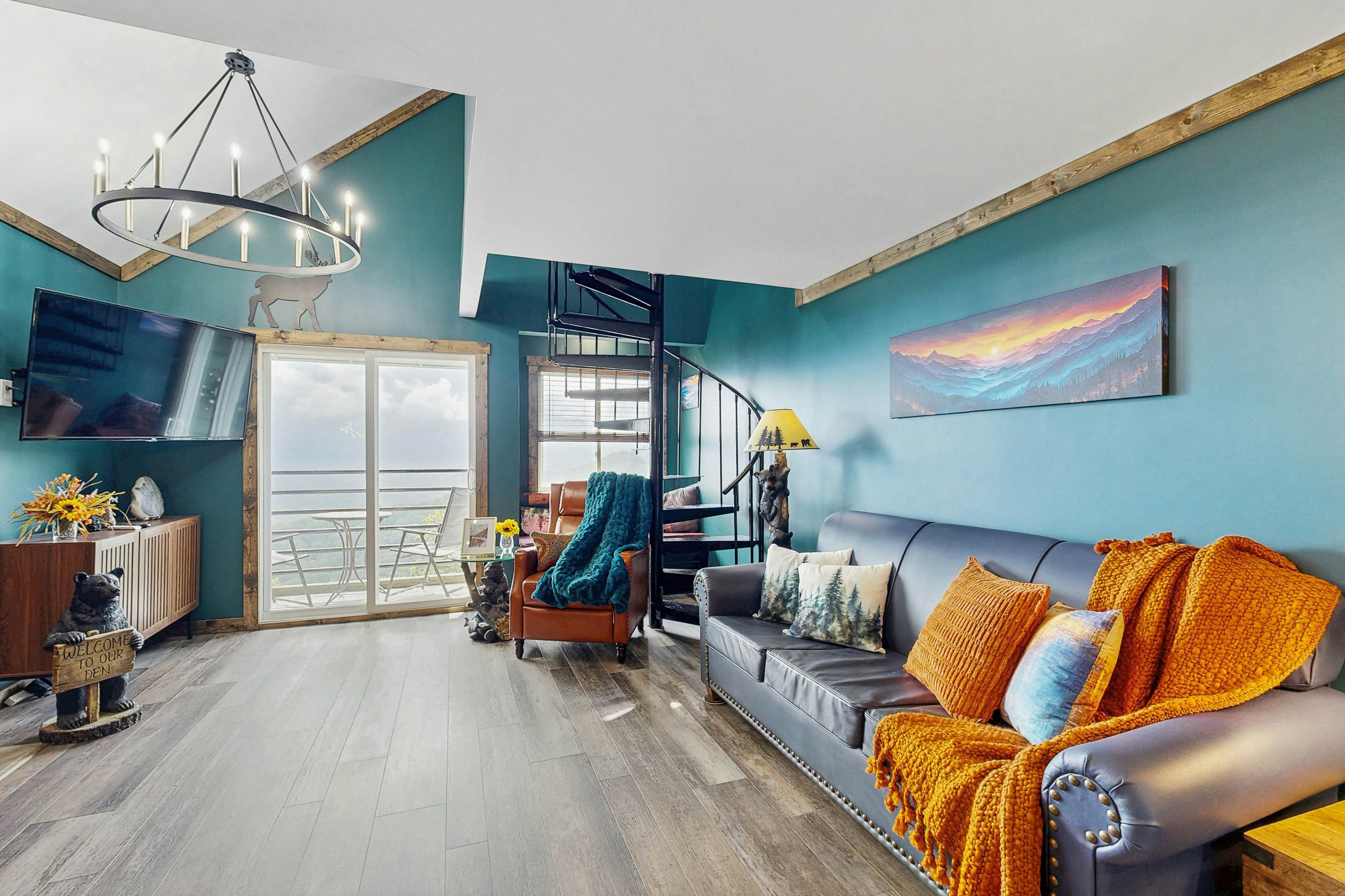 Mountain-view condo with private balcony, pool, & wood-burning fireplace