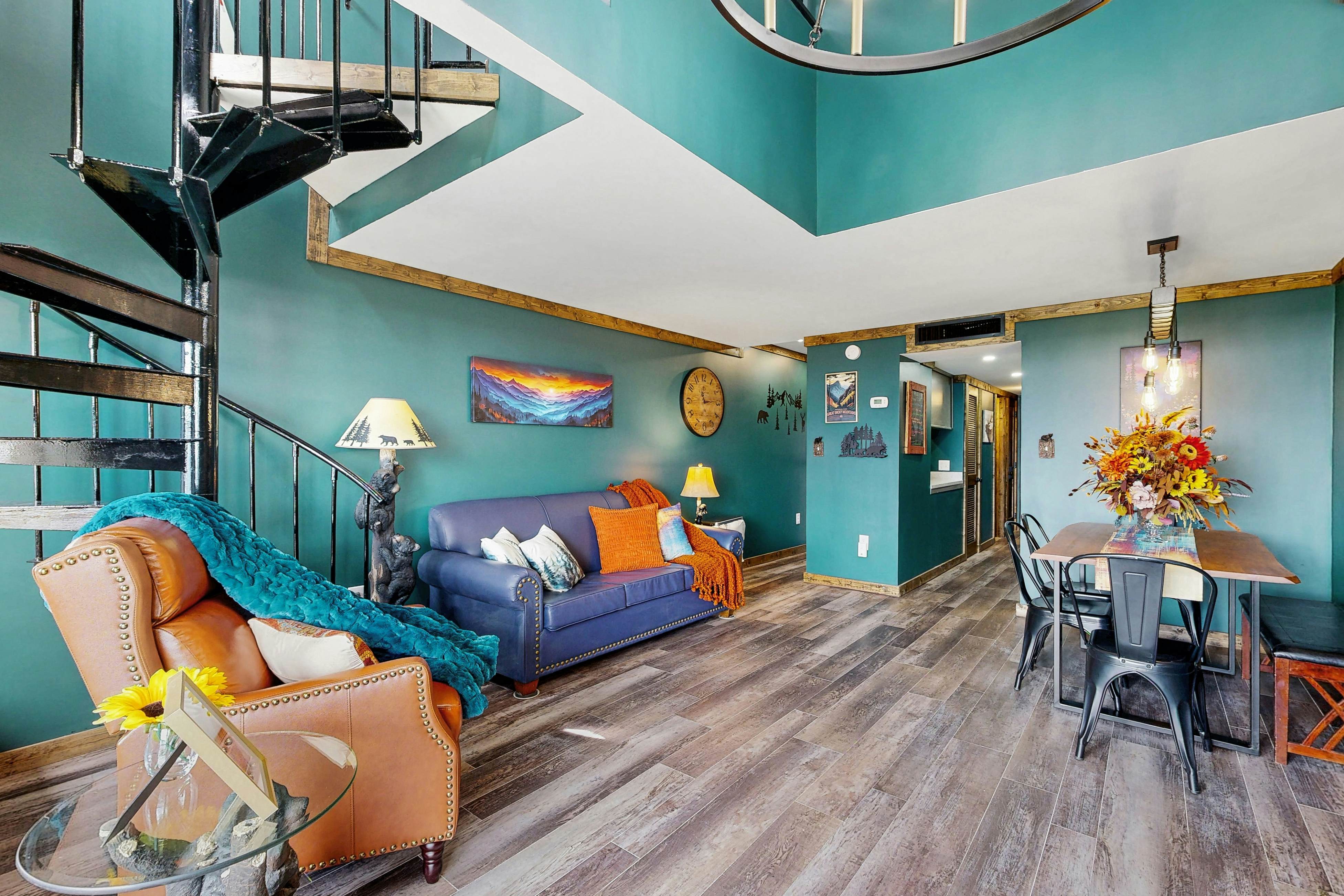 Mountain-view condo with private balcony, pool, & wood-burning fireplace