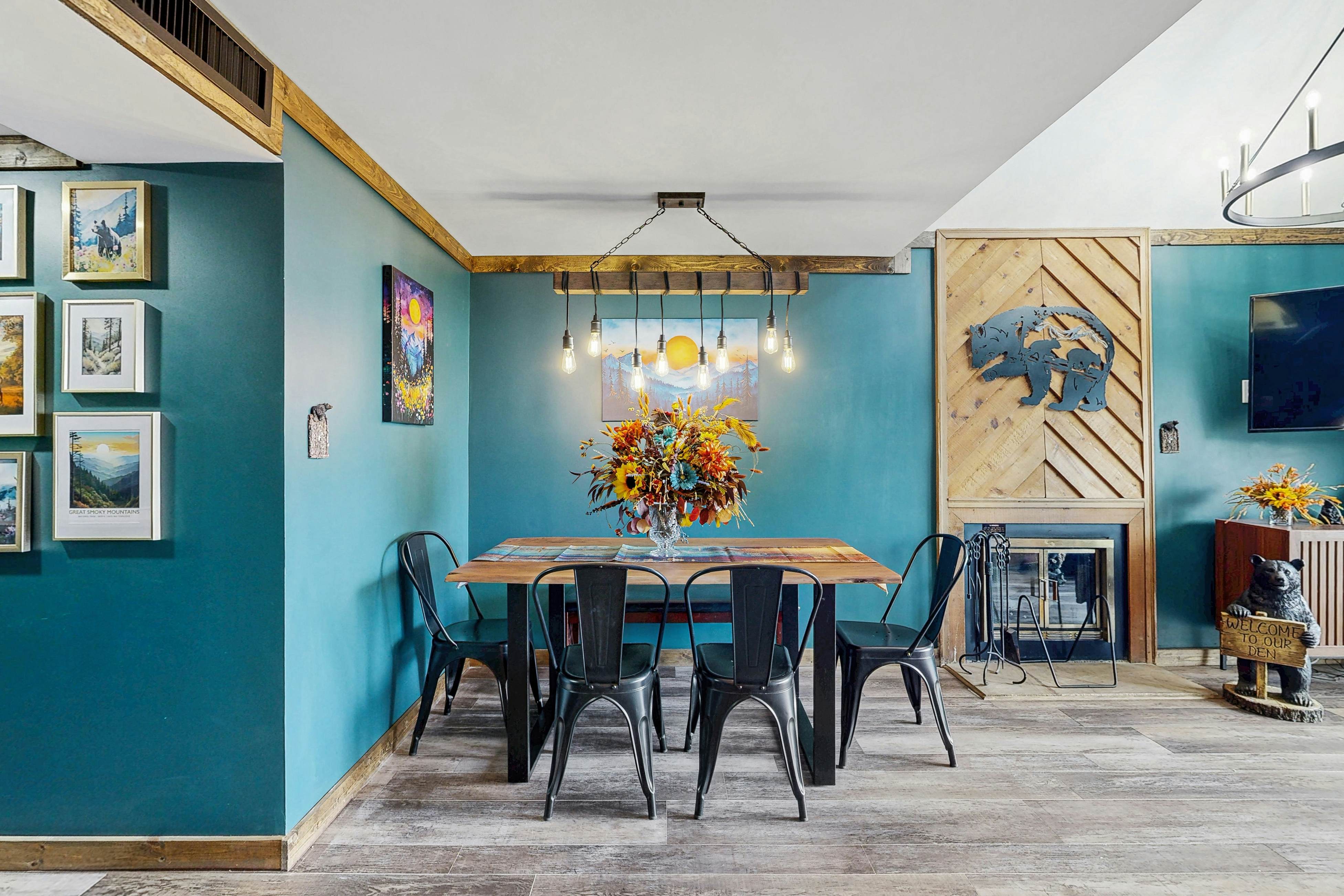 Mountain-view condo with private balcony, pool, & wood-burning fireplace