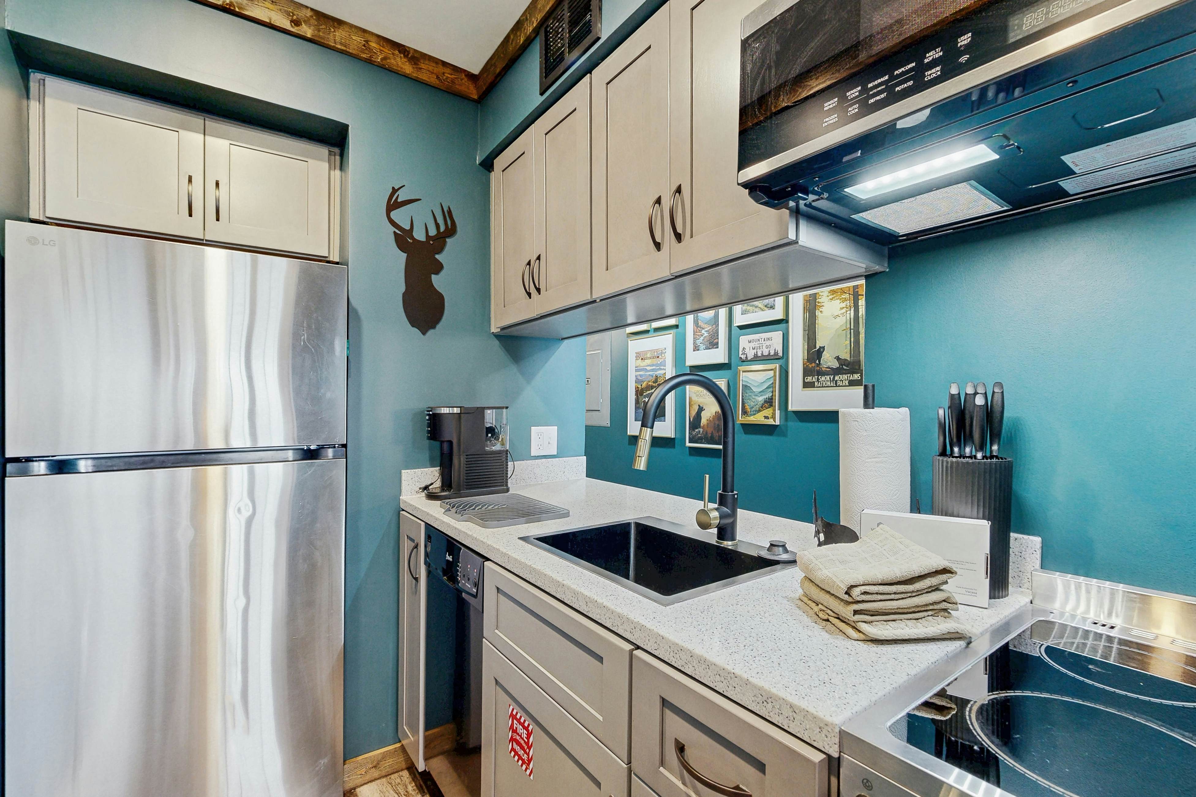 Mountain-view condo with private balcony, pool, & wood-burning fireplace