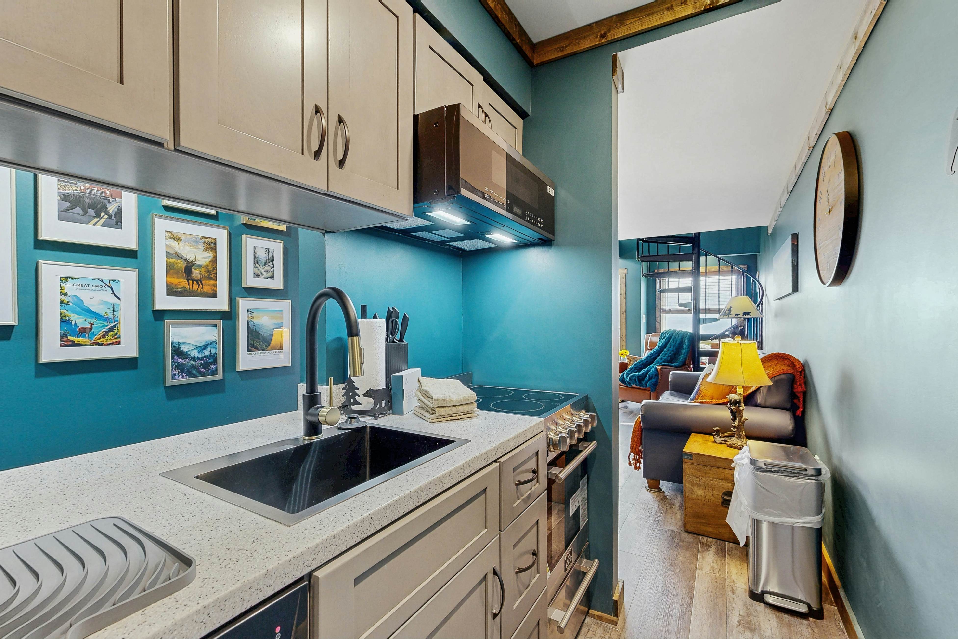 Mountain-view condo with private balcony, pool, & wood-burning fireplace