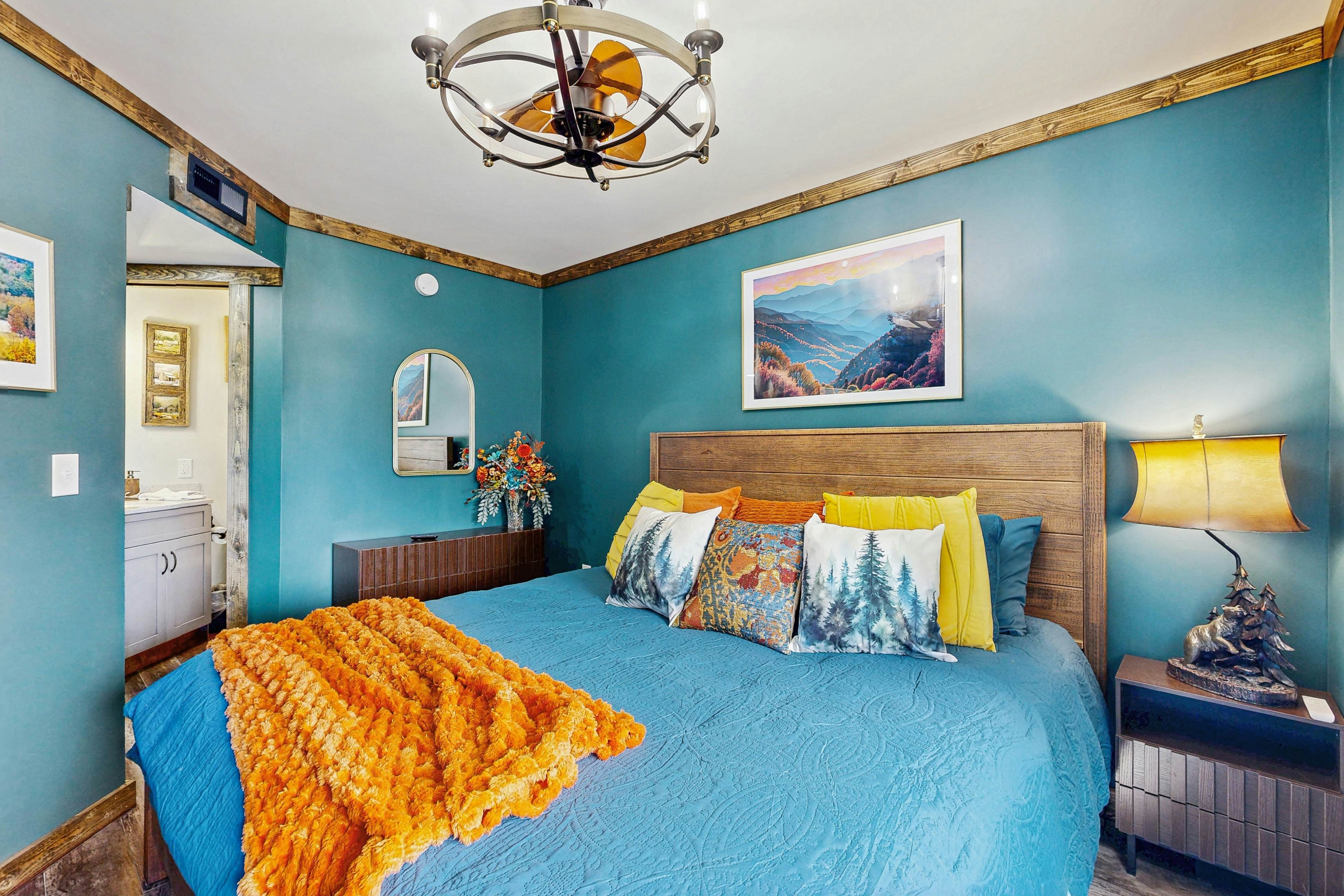 Mountain-view condo with private balcony, pool, & wood-burning fireplace