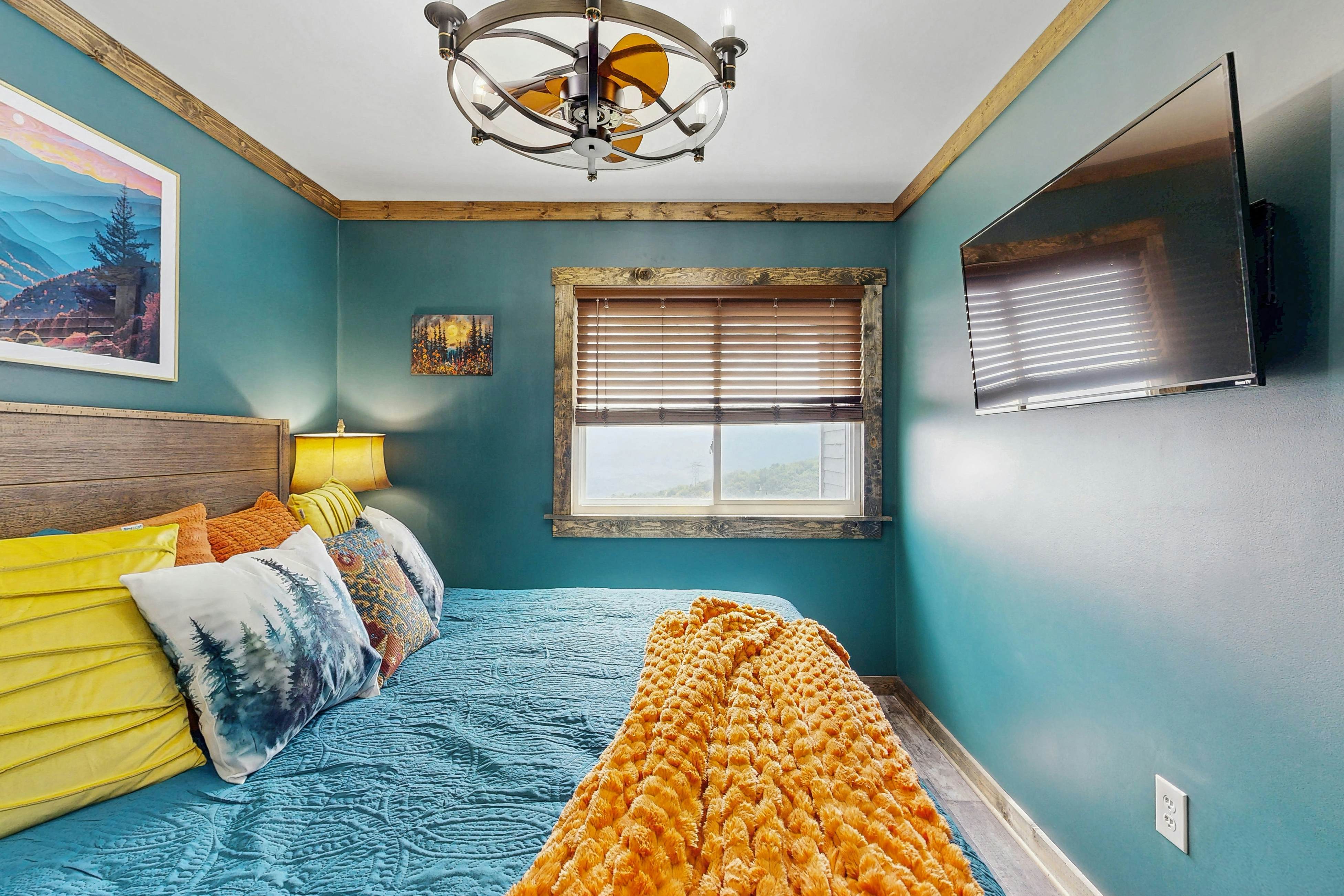 Mountain-view condo with private balcony, pool, & wood-burning fireplace