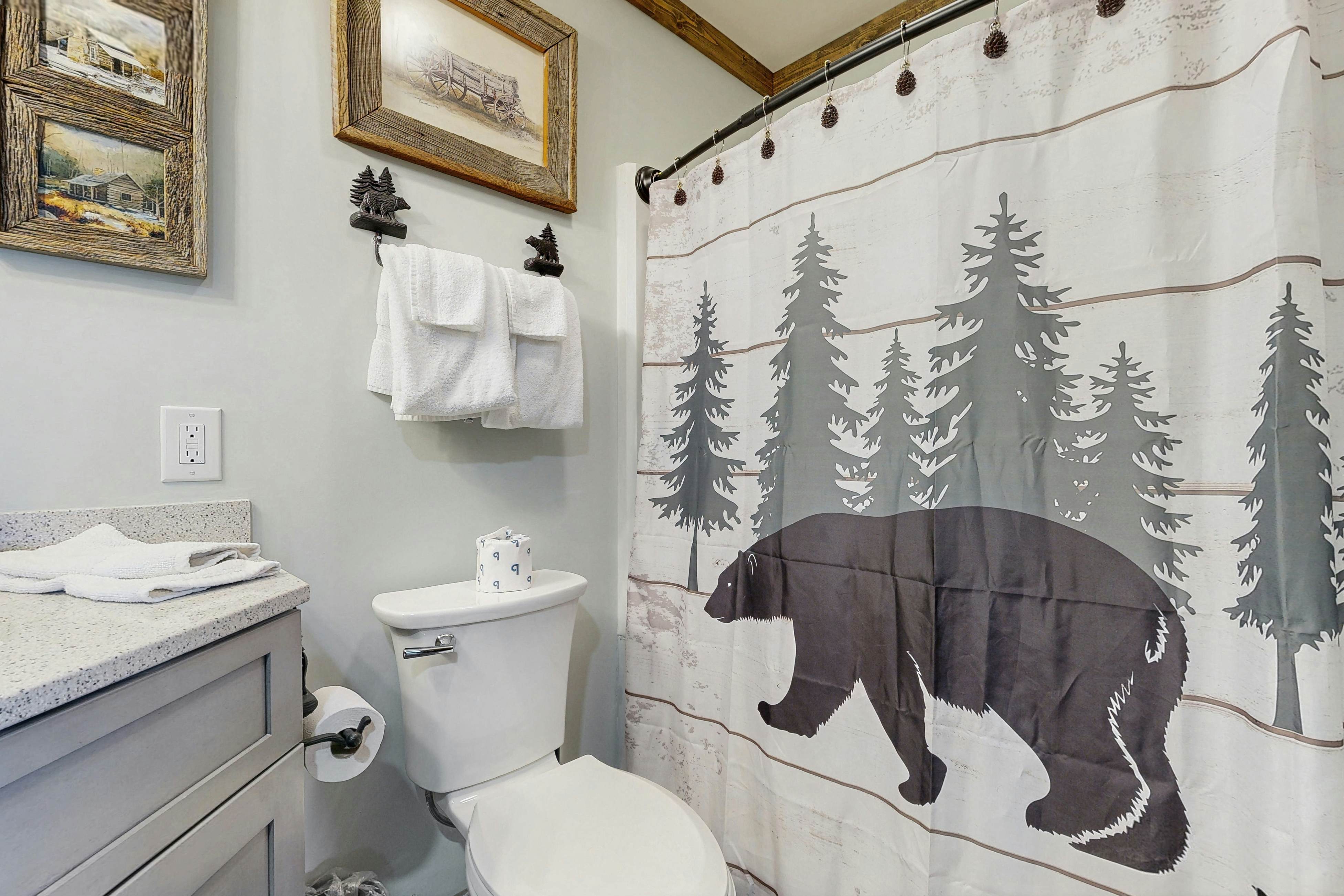 Mountain-view condo with private balcony, pool, & wood-burning fireplace