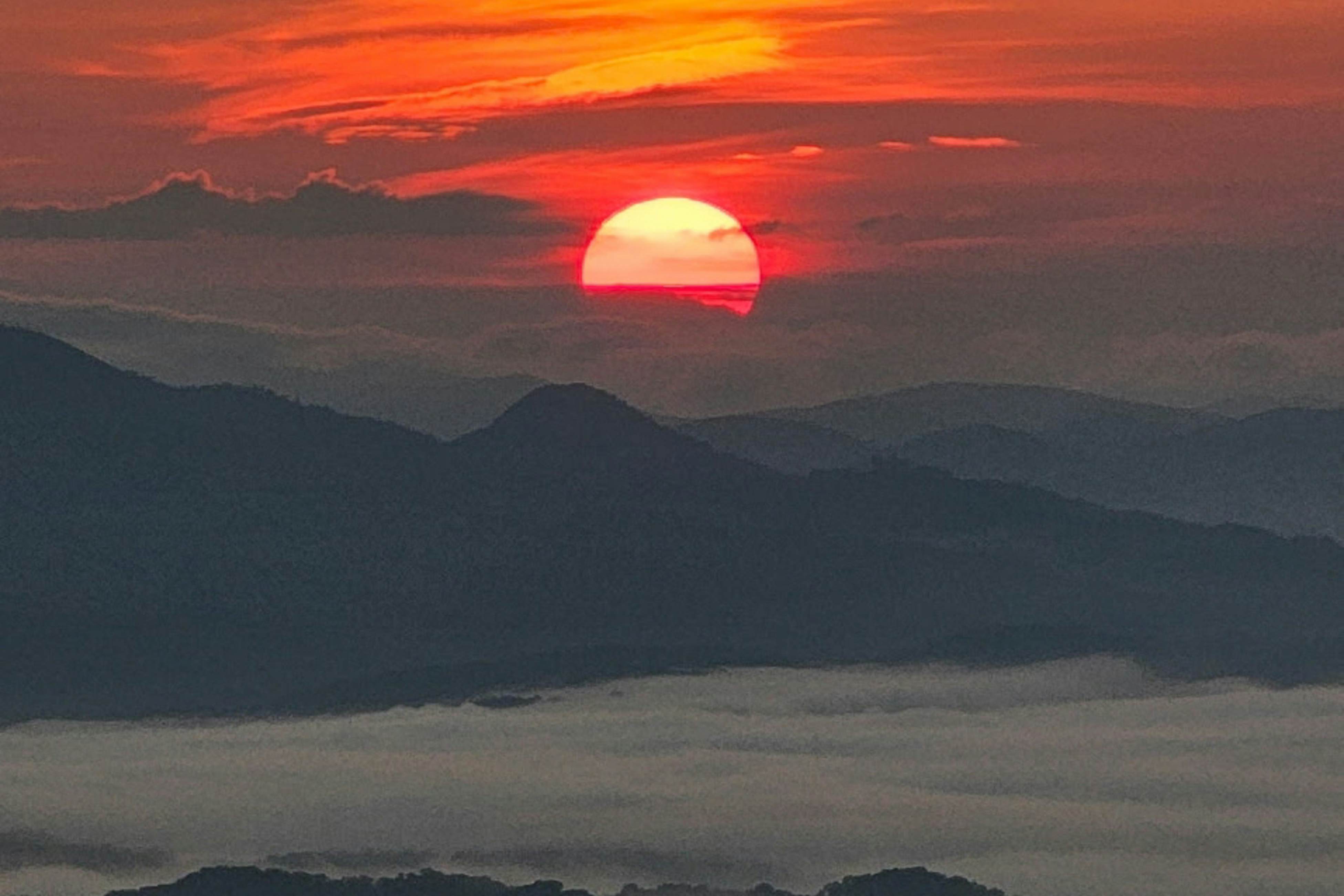 Mountain-view condo with private balcony, pool, & wood-burning fireplace