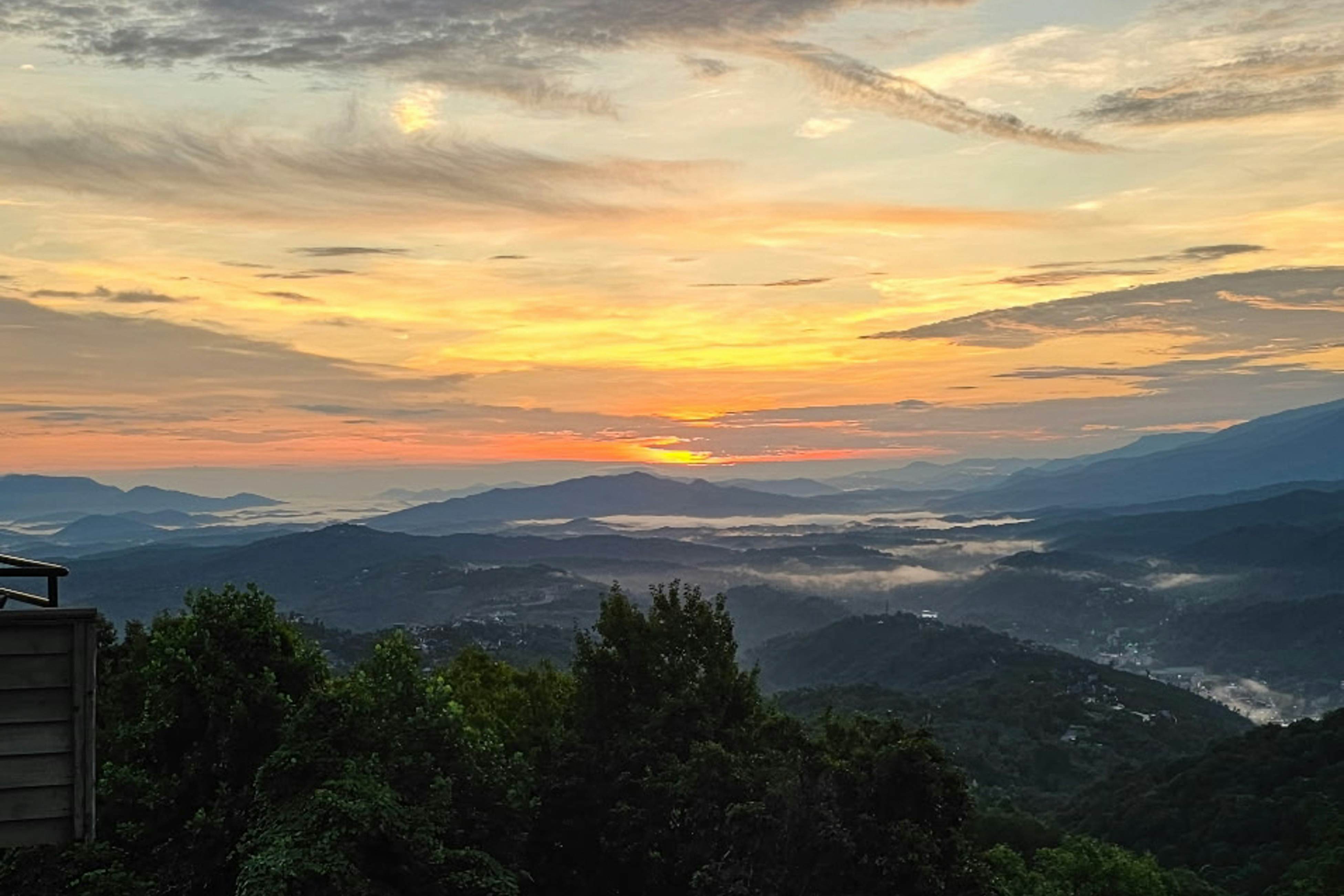 Mountain-view condo with private balcony, pool, & wood-burning fireplace
