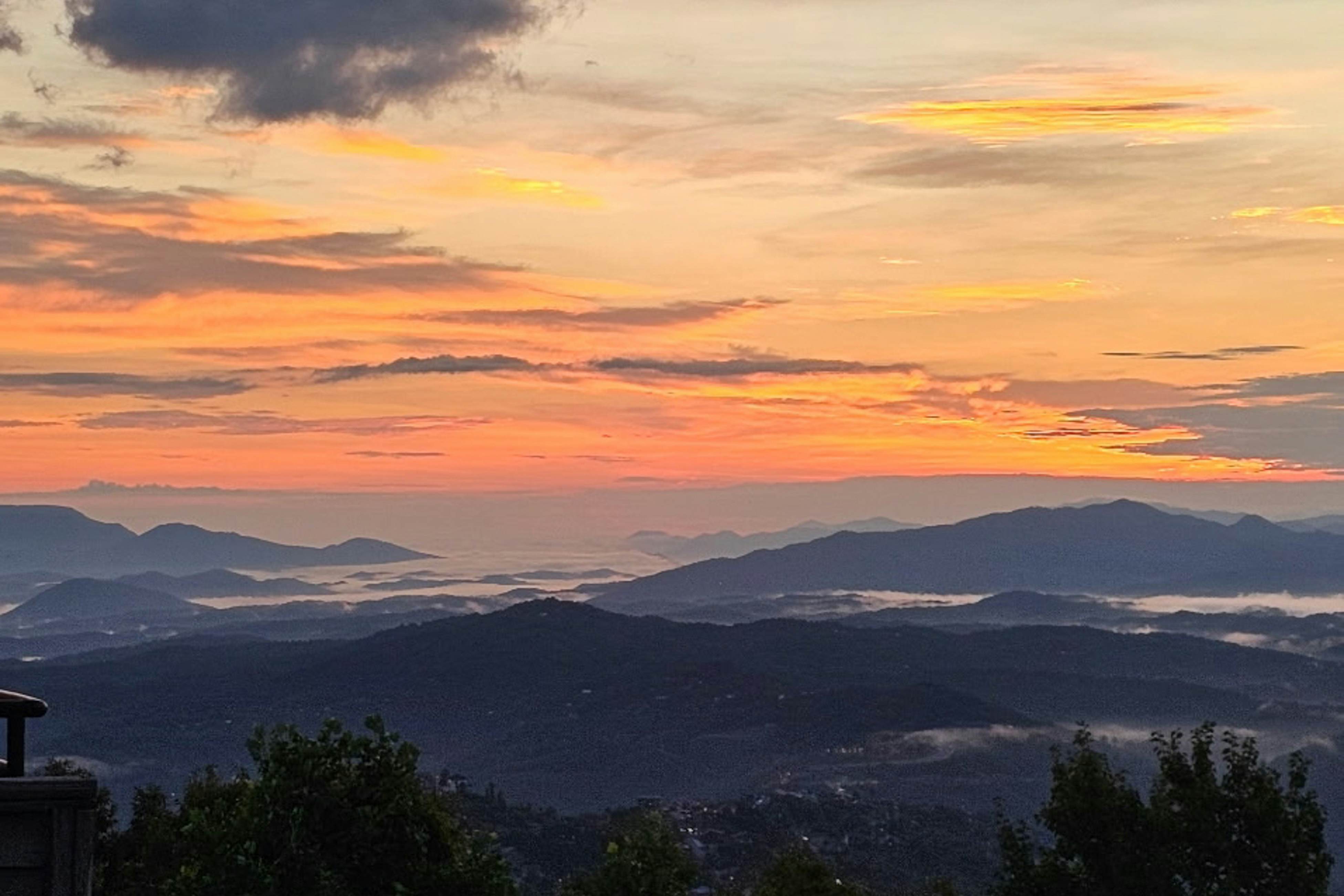 Mountain-view condo with private balcony, pool, & wood-burning fireplace