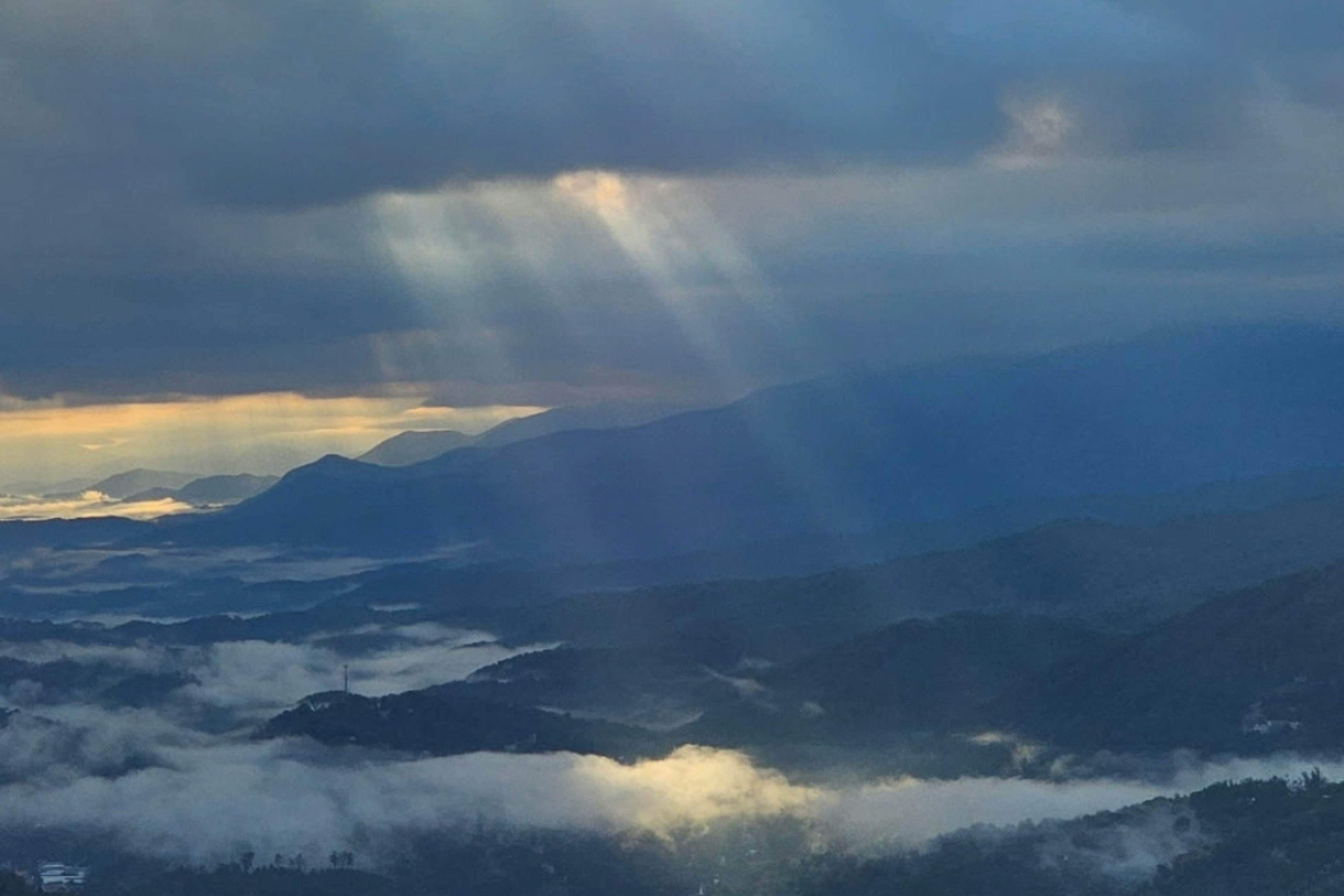 Mountain-view condo with private balcony, pool, & wood-burning fireplace