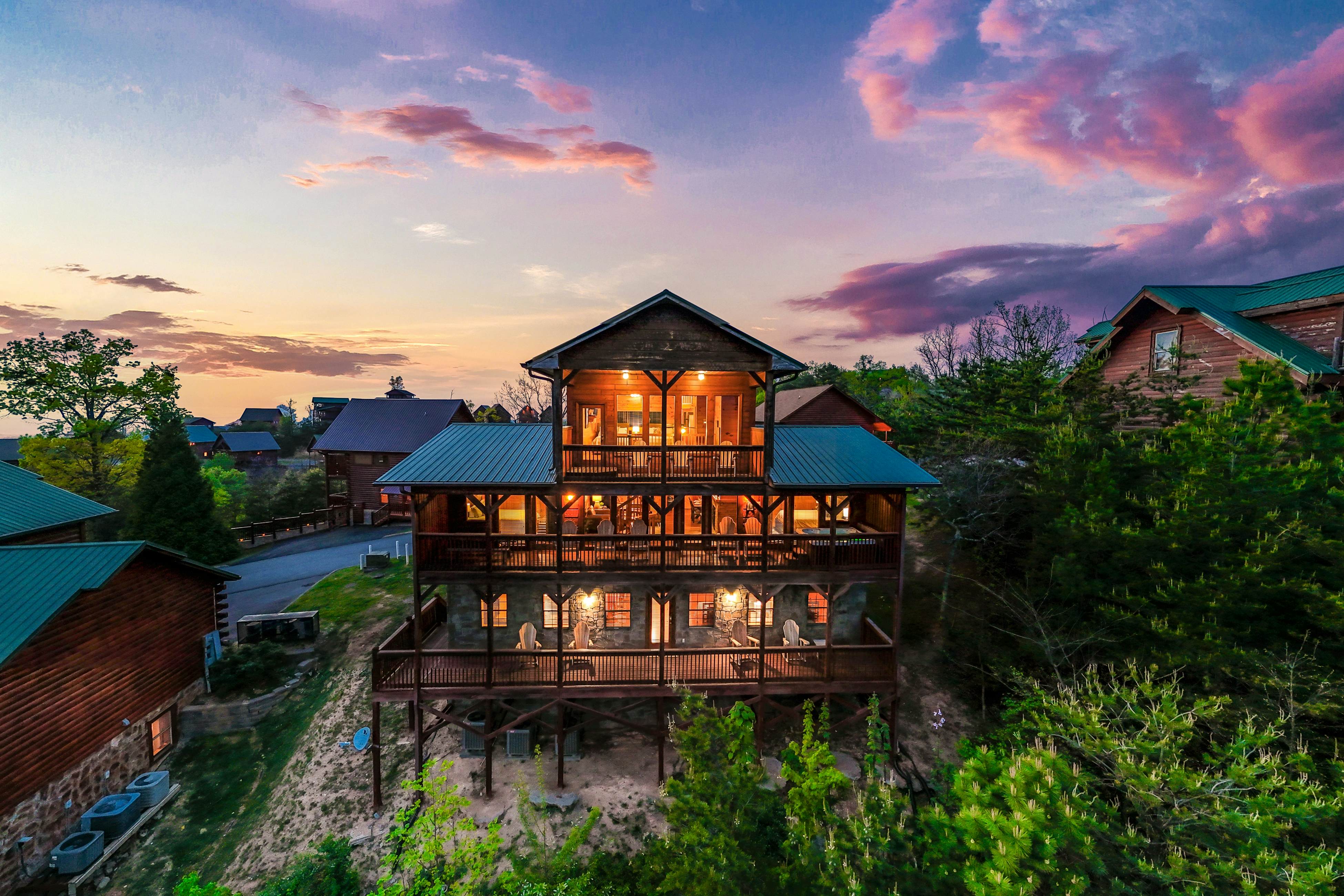 Rustic log cabin w/ Free Attraction Tickets, mountain views, hot tub, & games