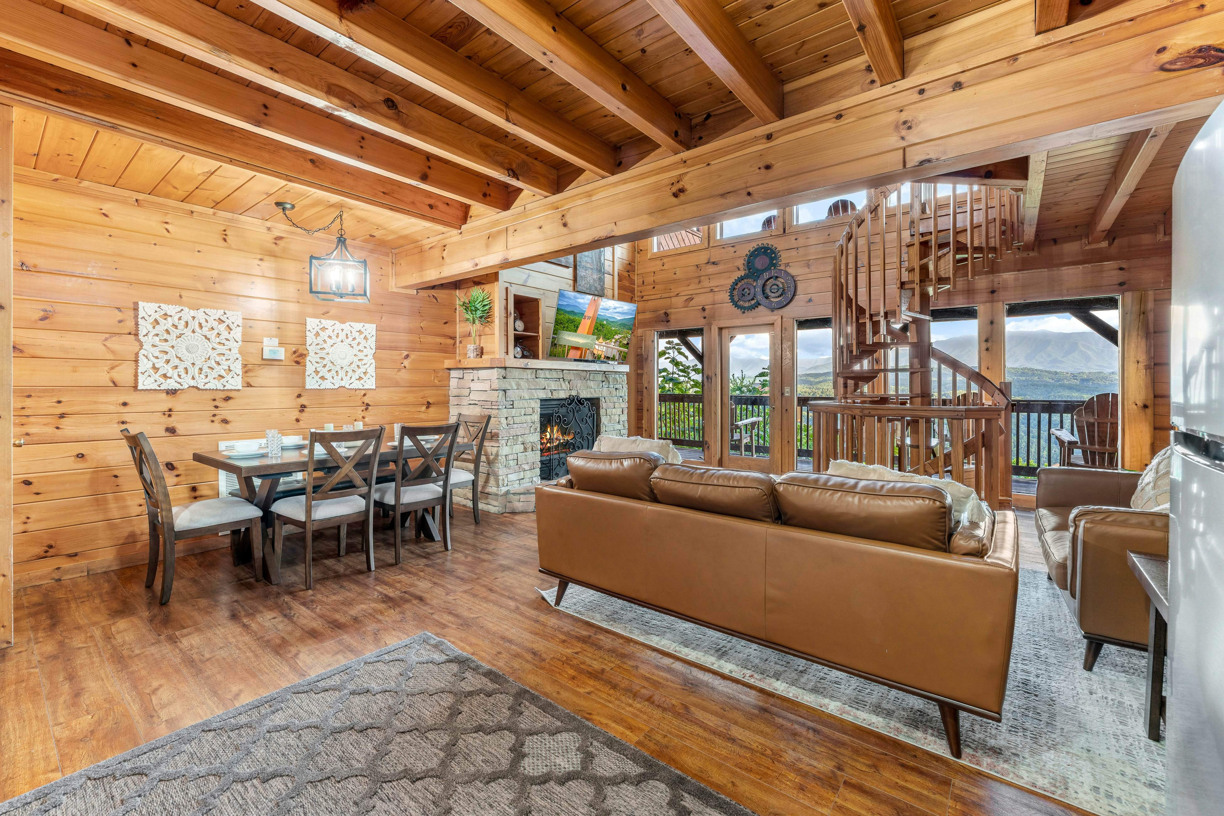 Rustic log cabin w/ Free Attraction Tickets, mountain views, hot tub, & games
